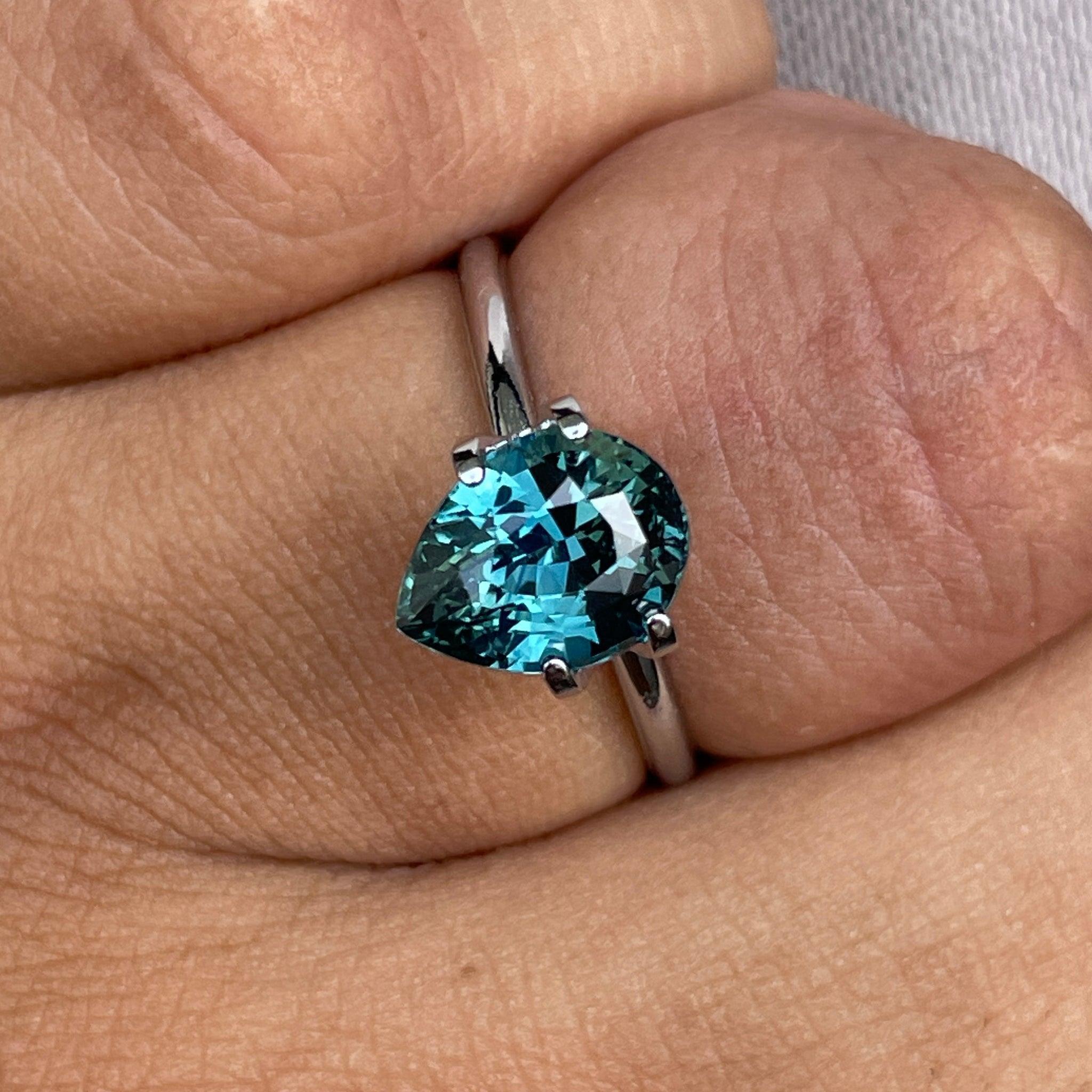 teal blue green parti sapphire pear drop cut gem