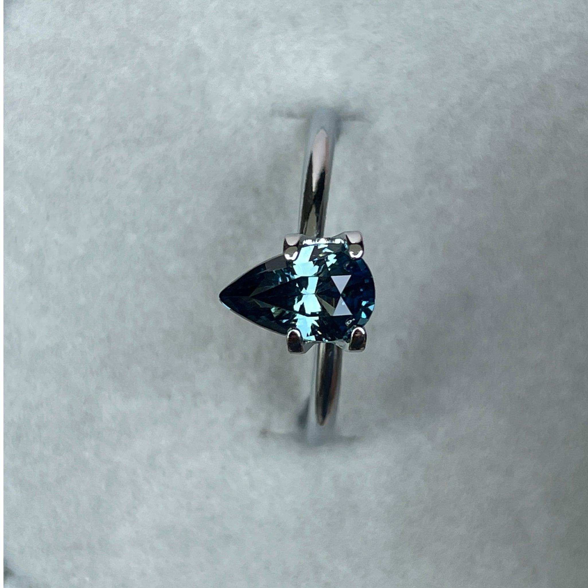 teal blue green parti sapphire pear drop cut gem