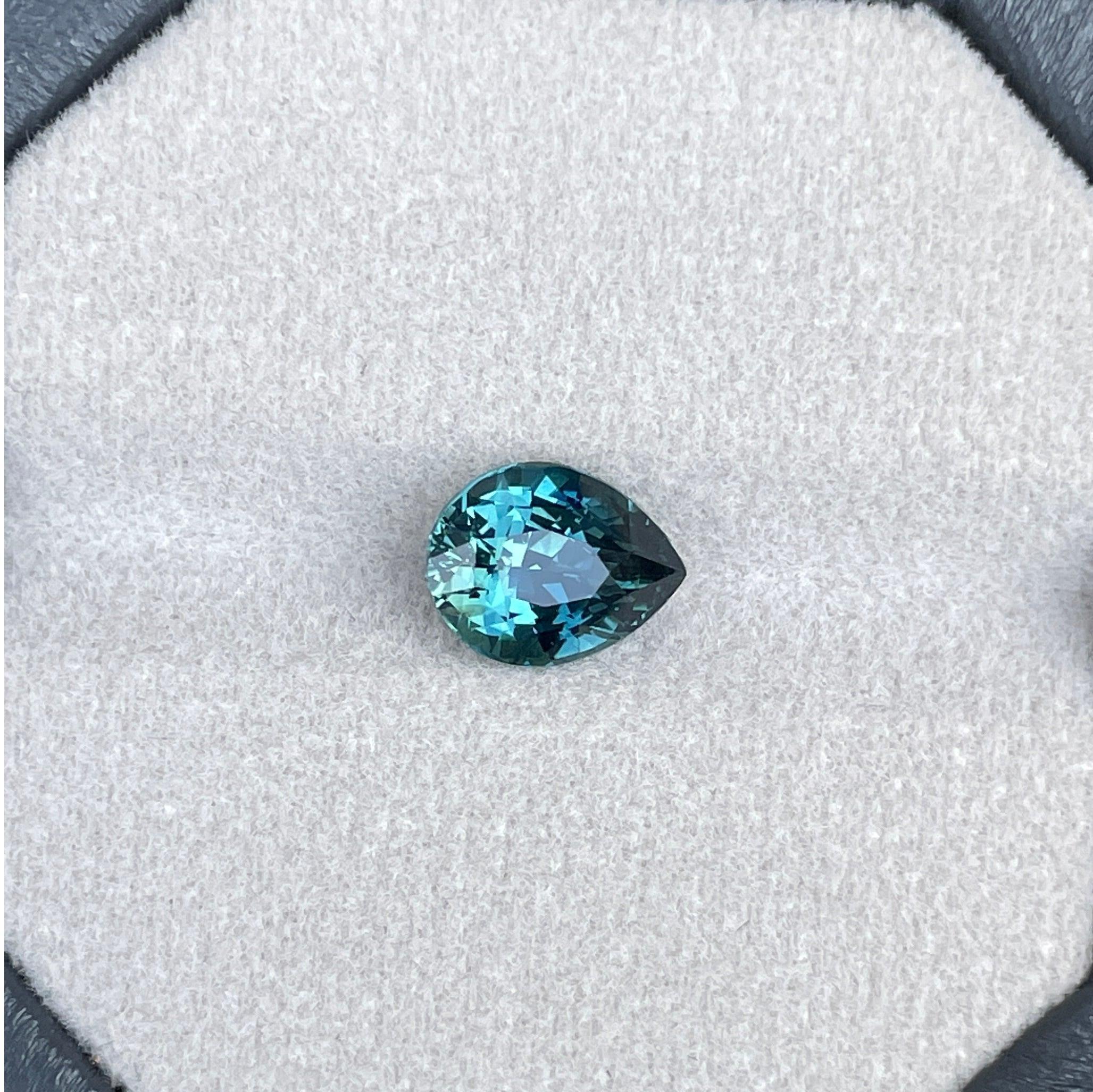 teal blue green parti sapphire pear drop cut gem