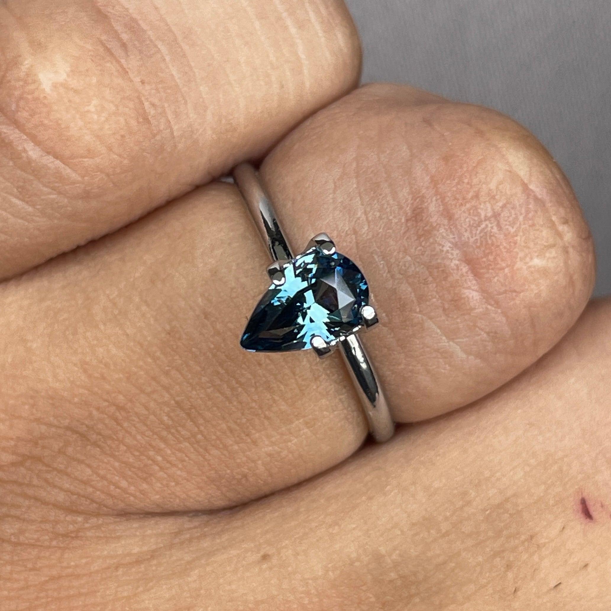 teal blue green parti sapphire pear drop cut gem