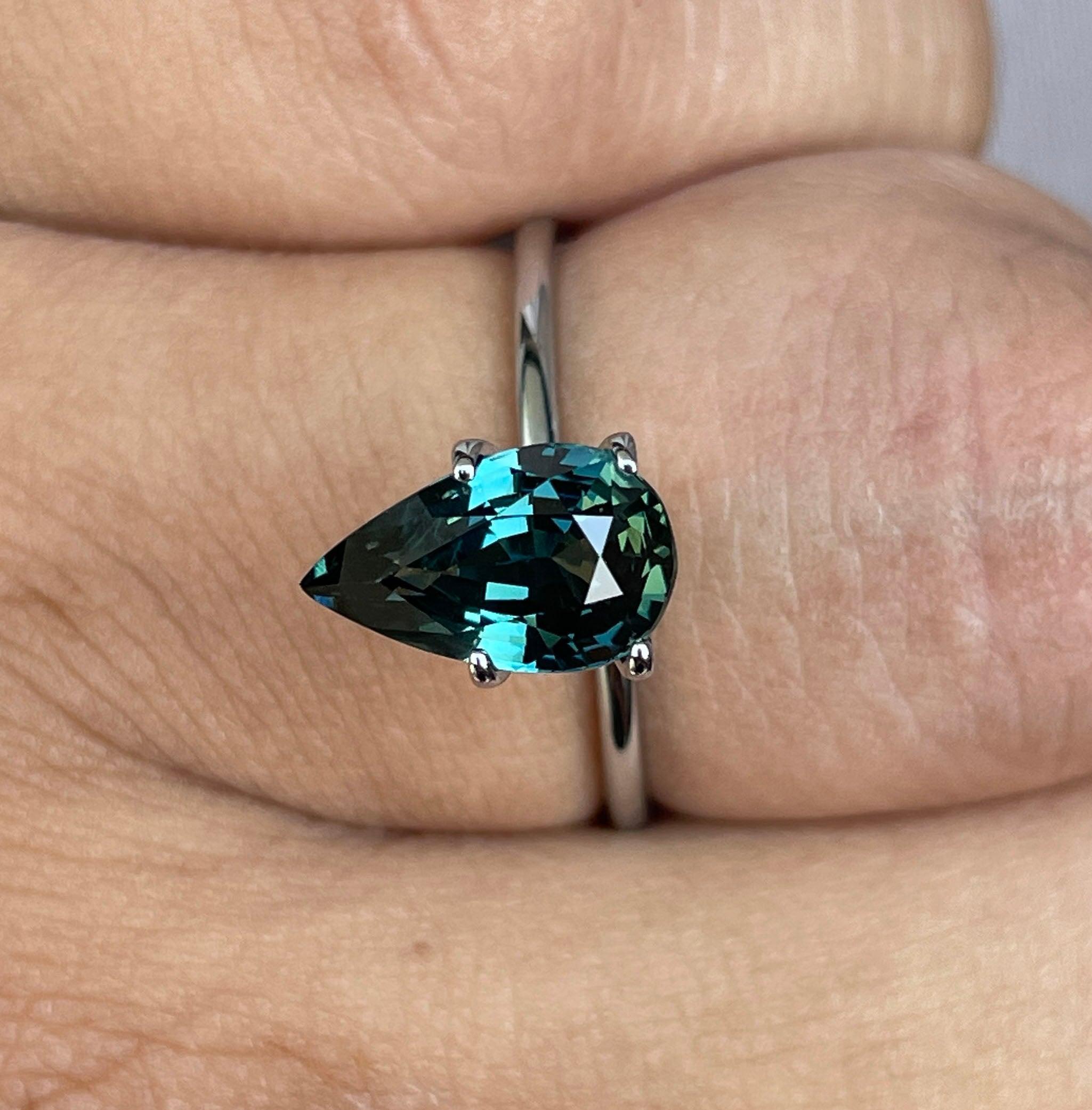teal blue green parti sapphire pear drop cut gem