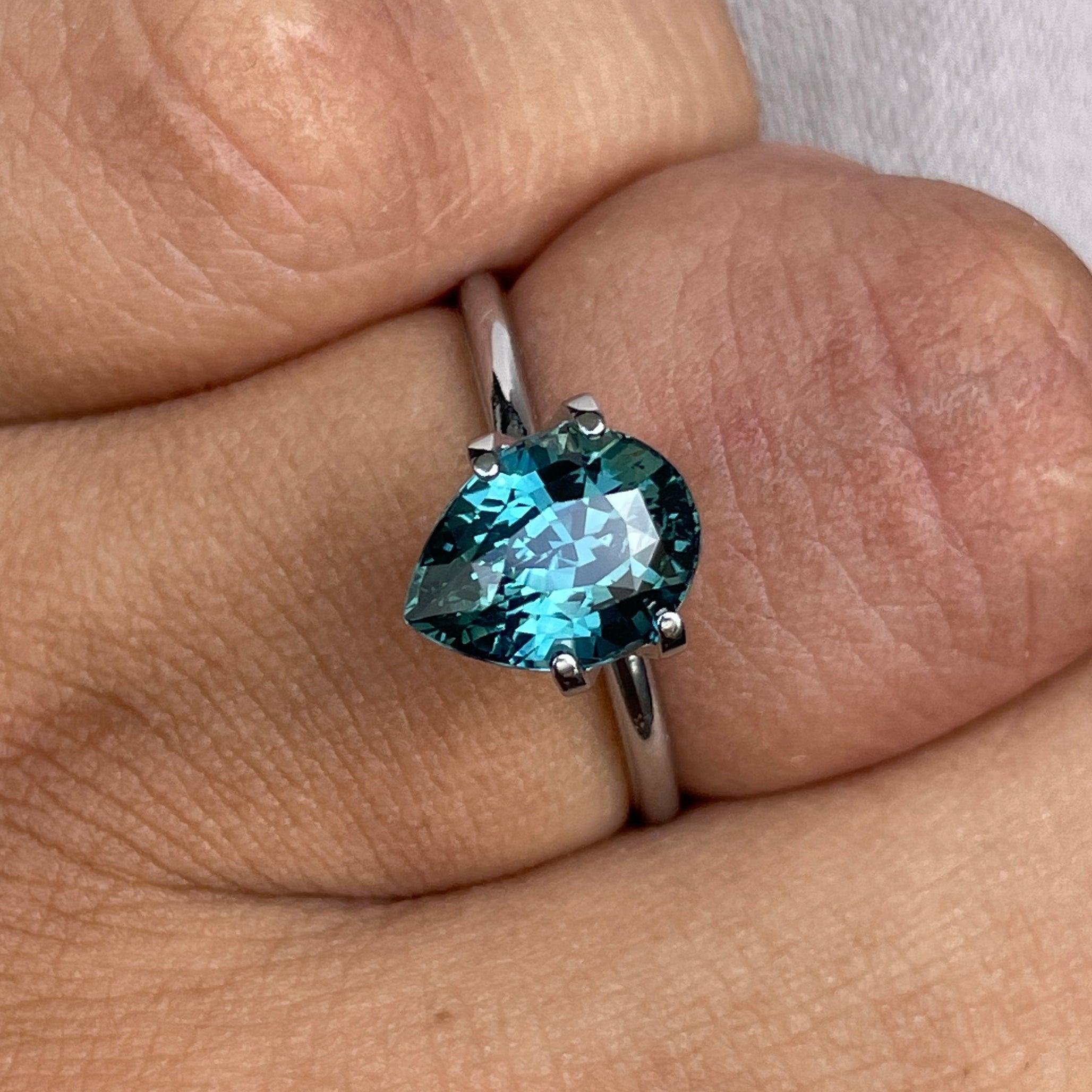 teal blue green parti sapphire pear drop cut gem