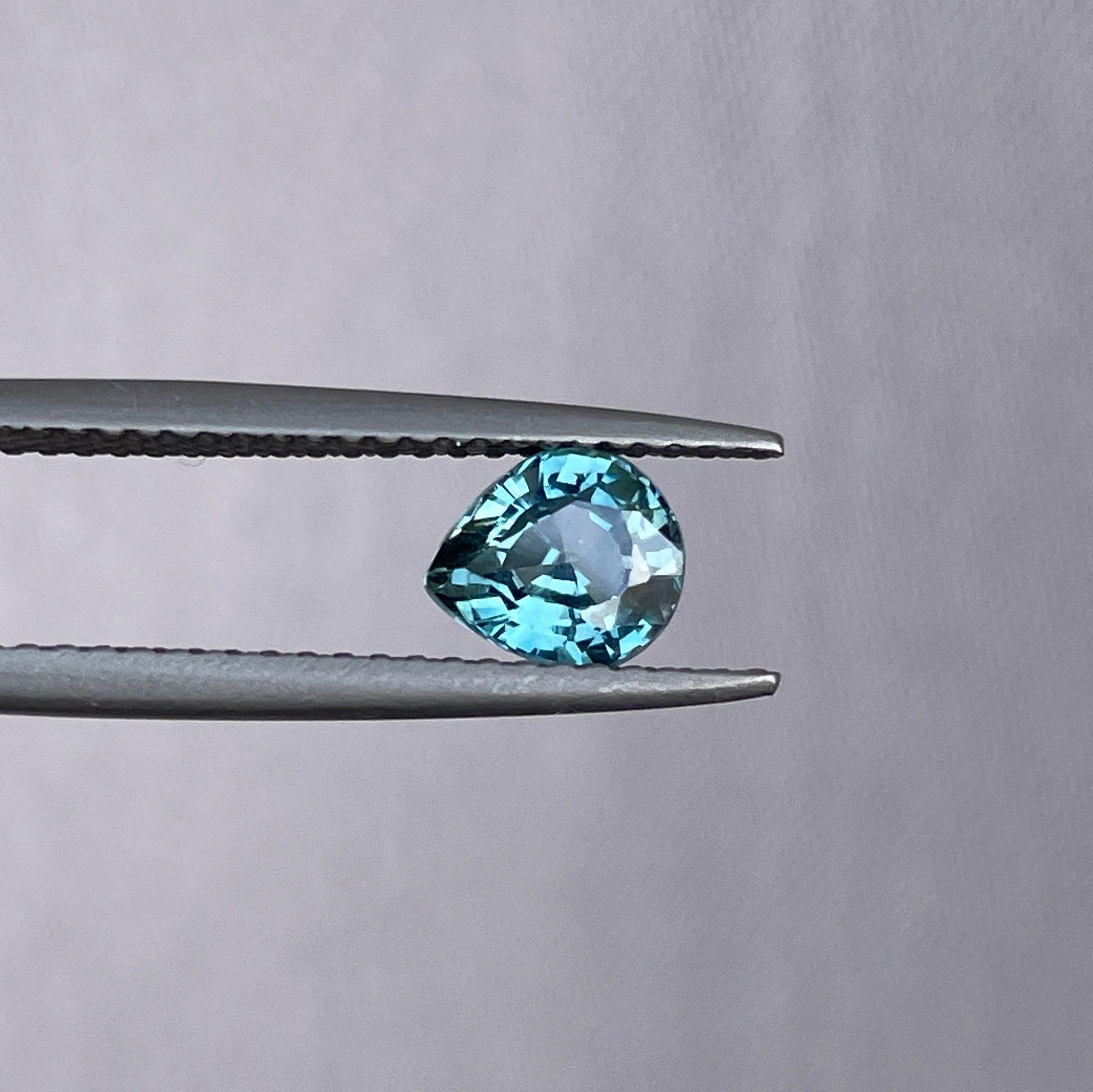 teal blue green parti sapphire pear drop cut gem