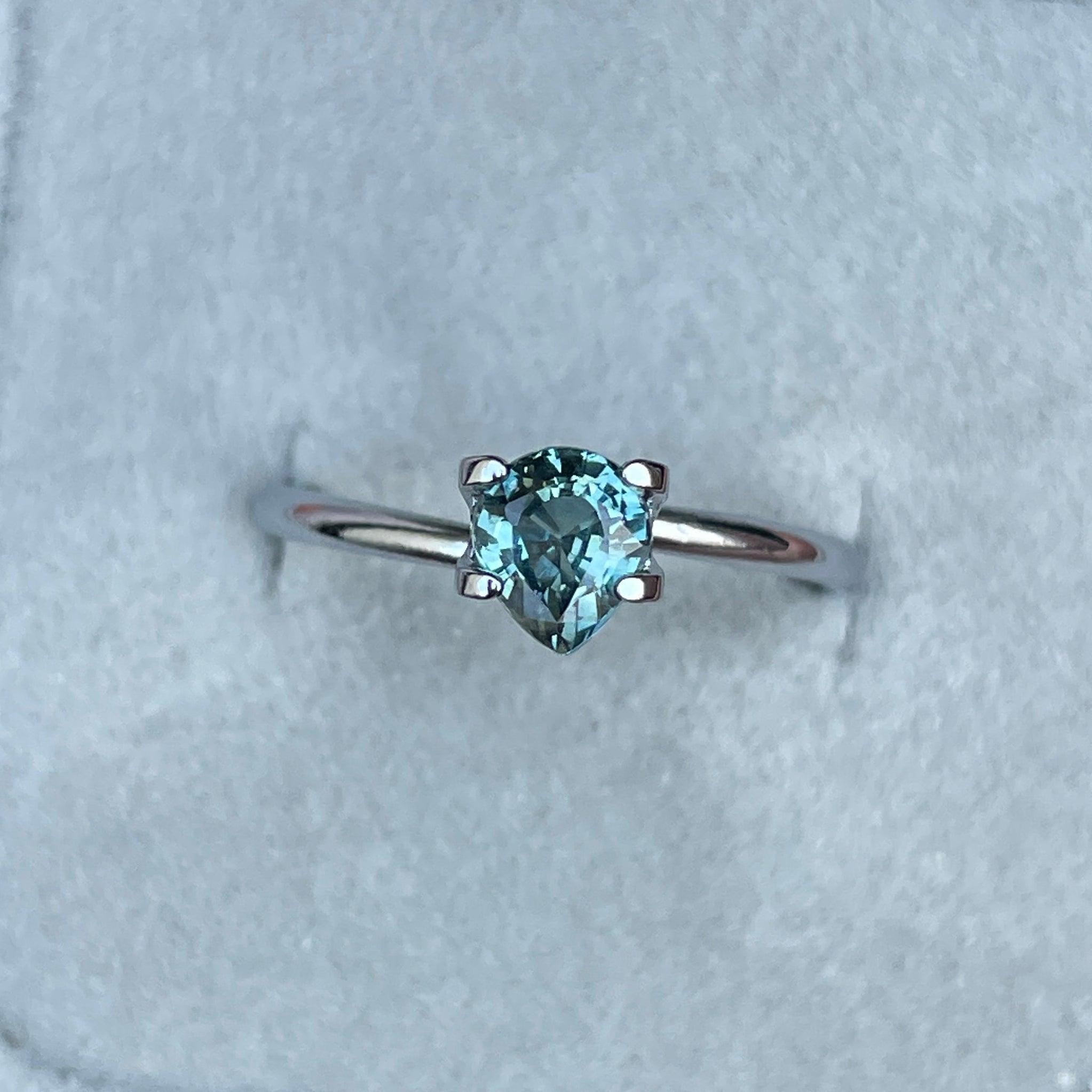 teal blue green parti sapphire pear drop cut gem