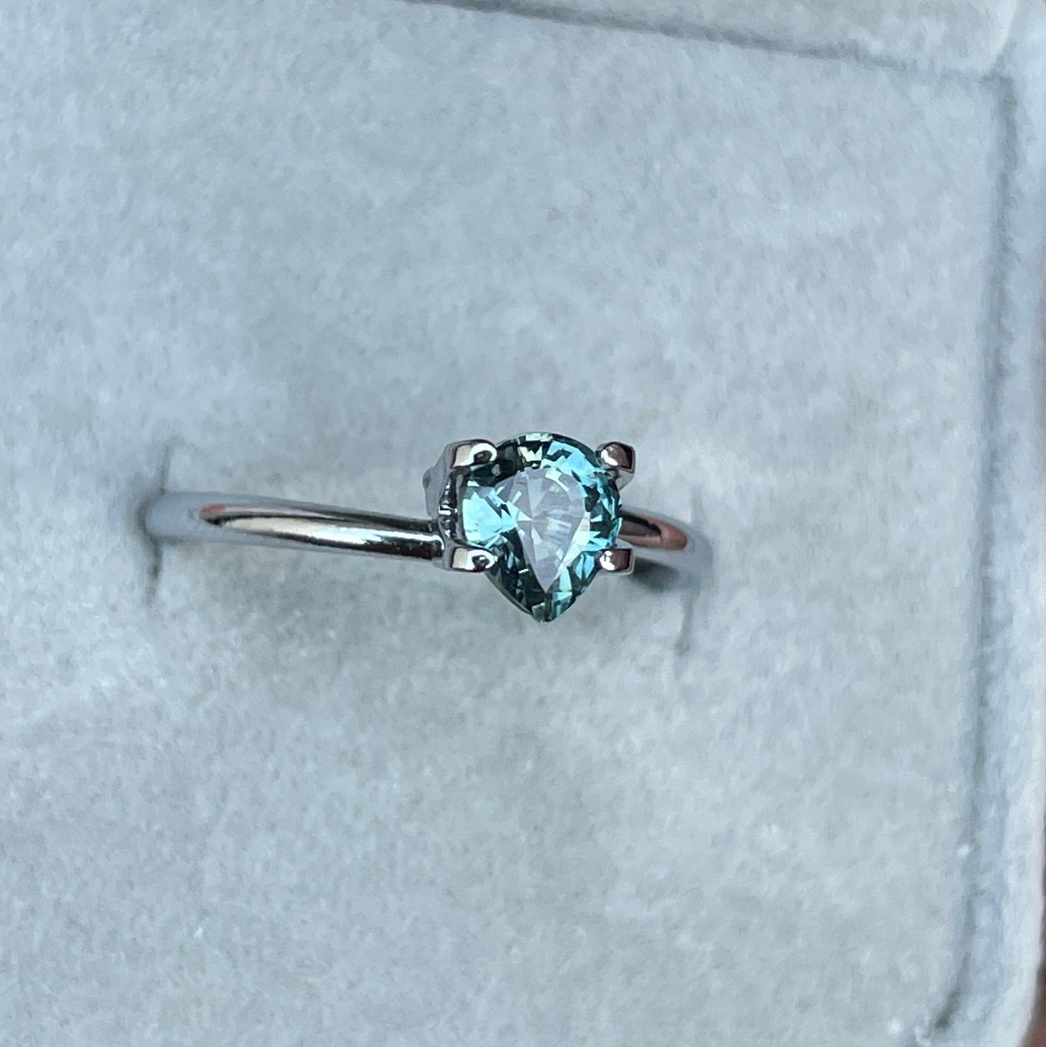 teal blue green parti sapphire pear drop cut gem