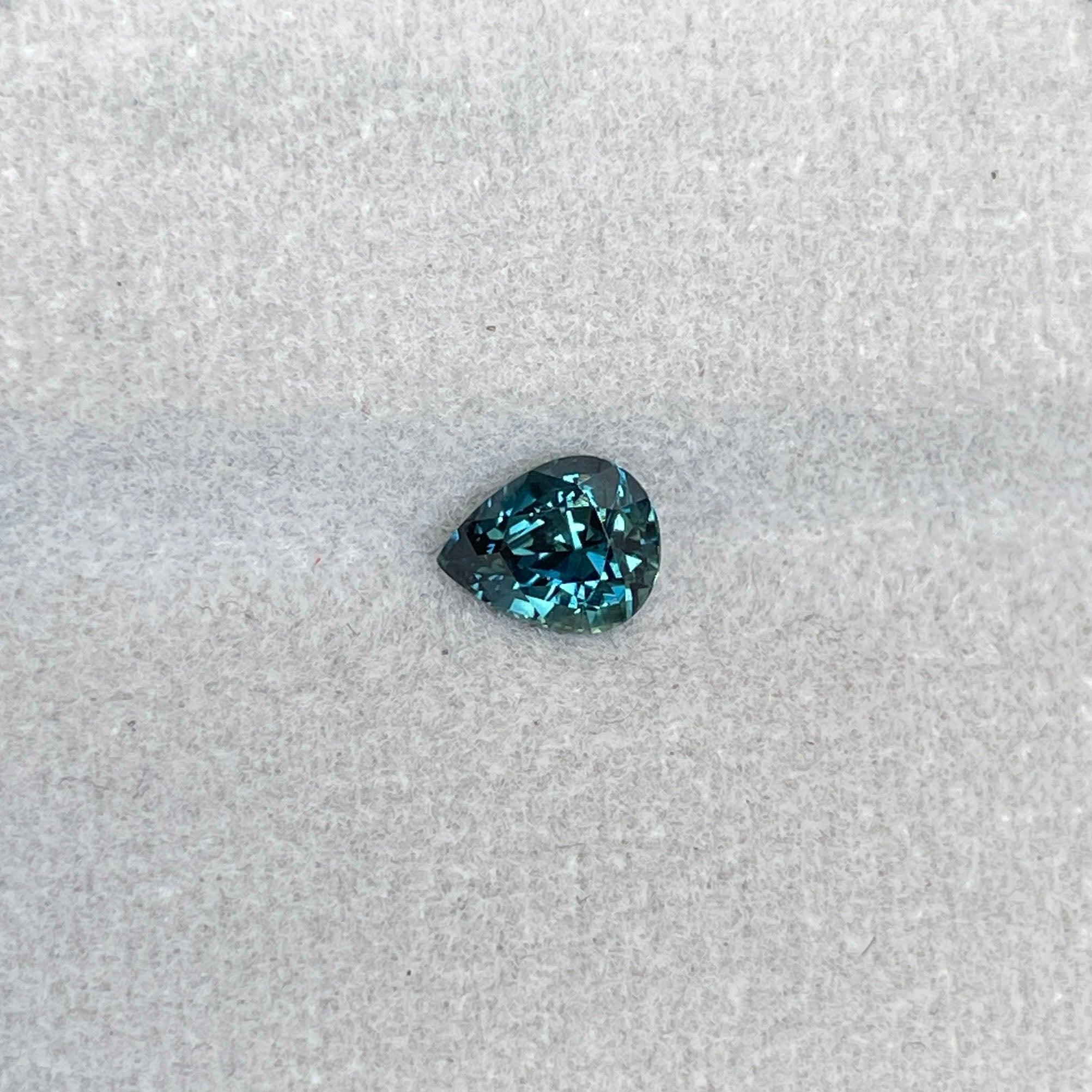 teal blue green parti sapphire pear drop cut gem