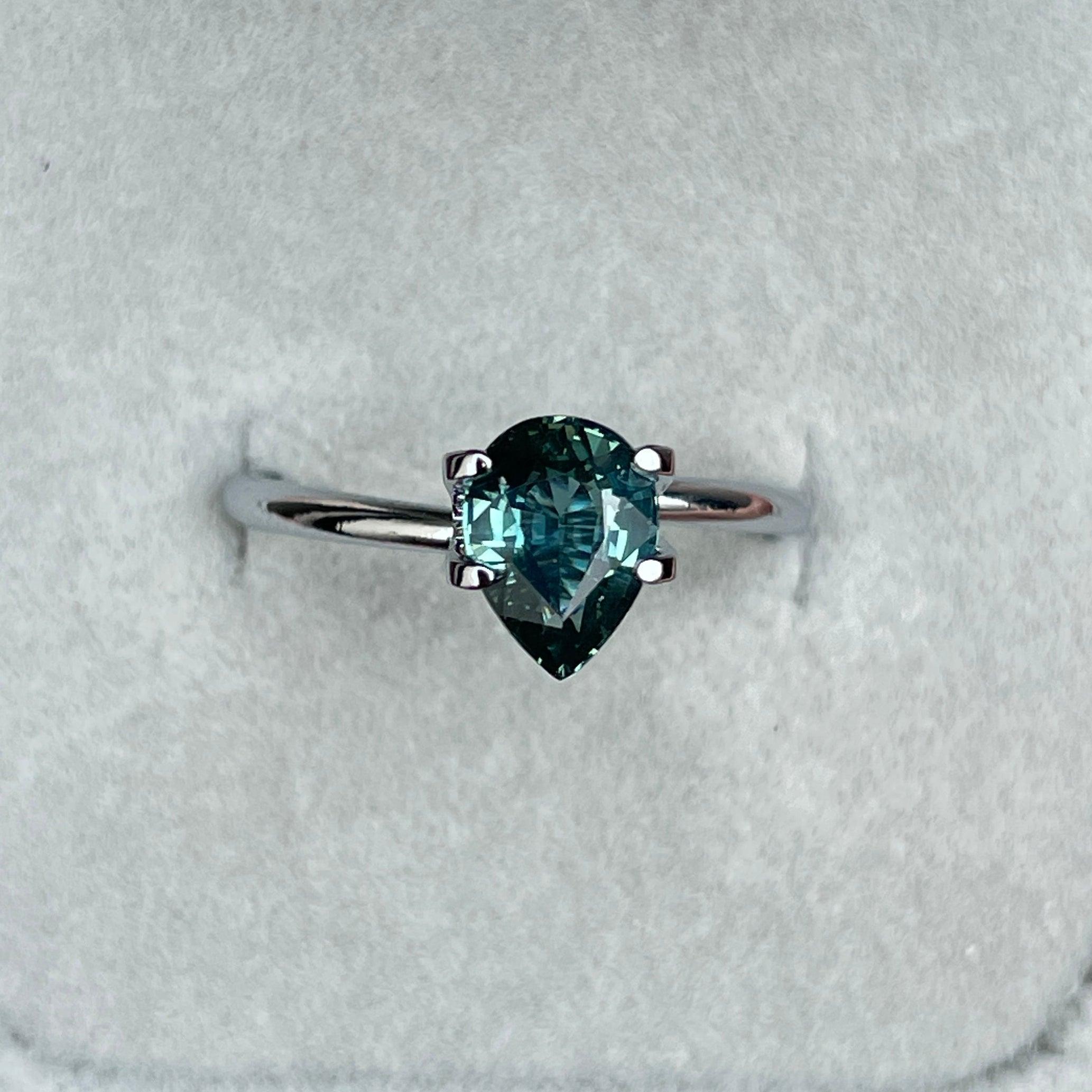 teal blue green parti sapphire pear drop cut gem