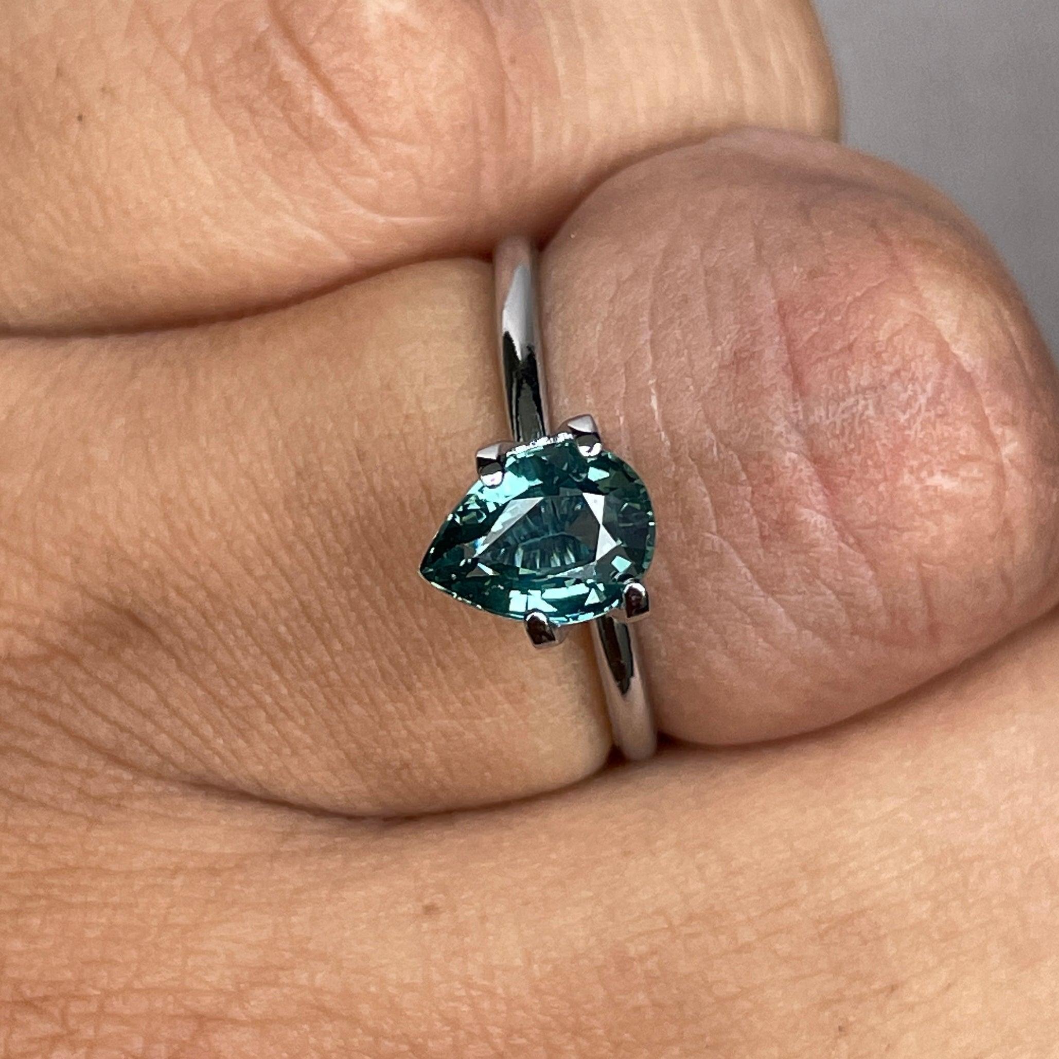teal blue green parti sapphire pear drop cut gem