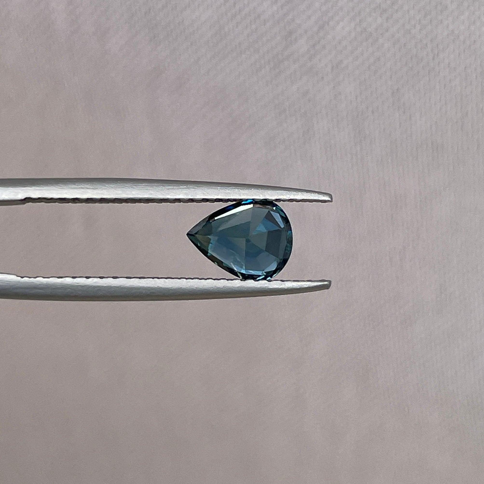 teal blue green parti sapphire pear drop cut gem