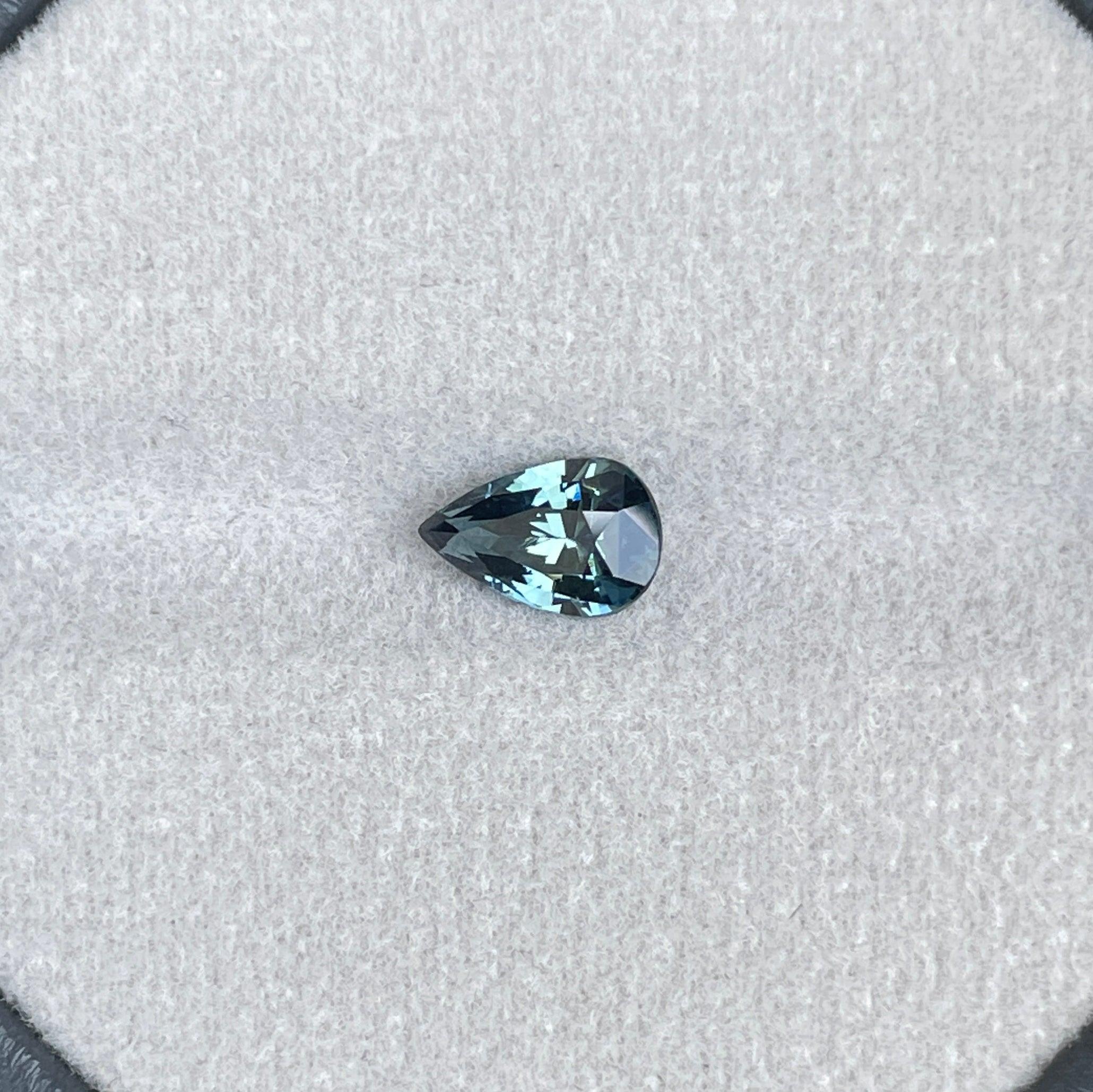 teal blue green parti sapphire pear drop cut gem