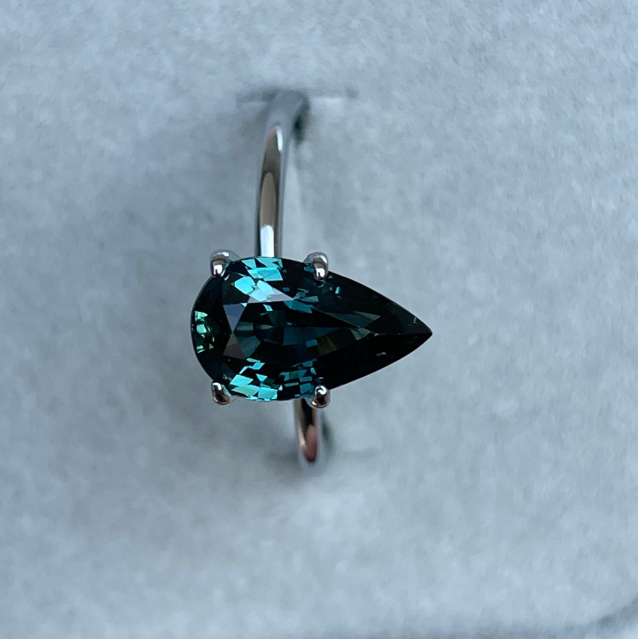 teal blue green parti sapphire pear drop cut gem