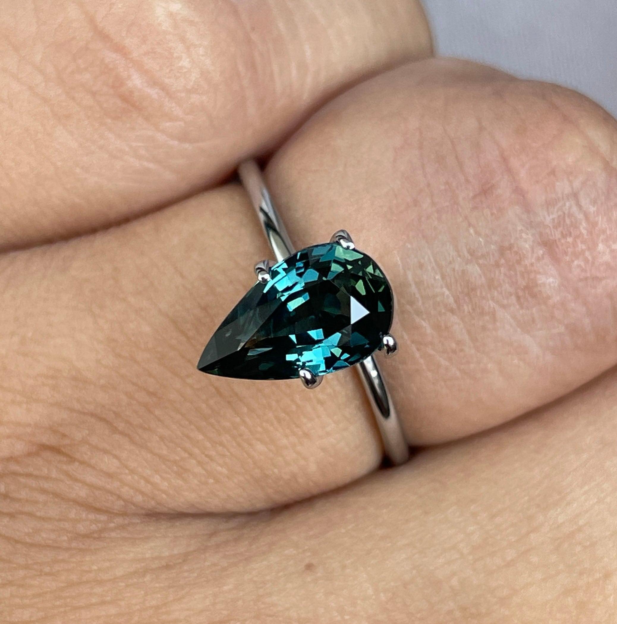 teal blue green parti sapphire pear drop cut gem