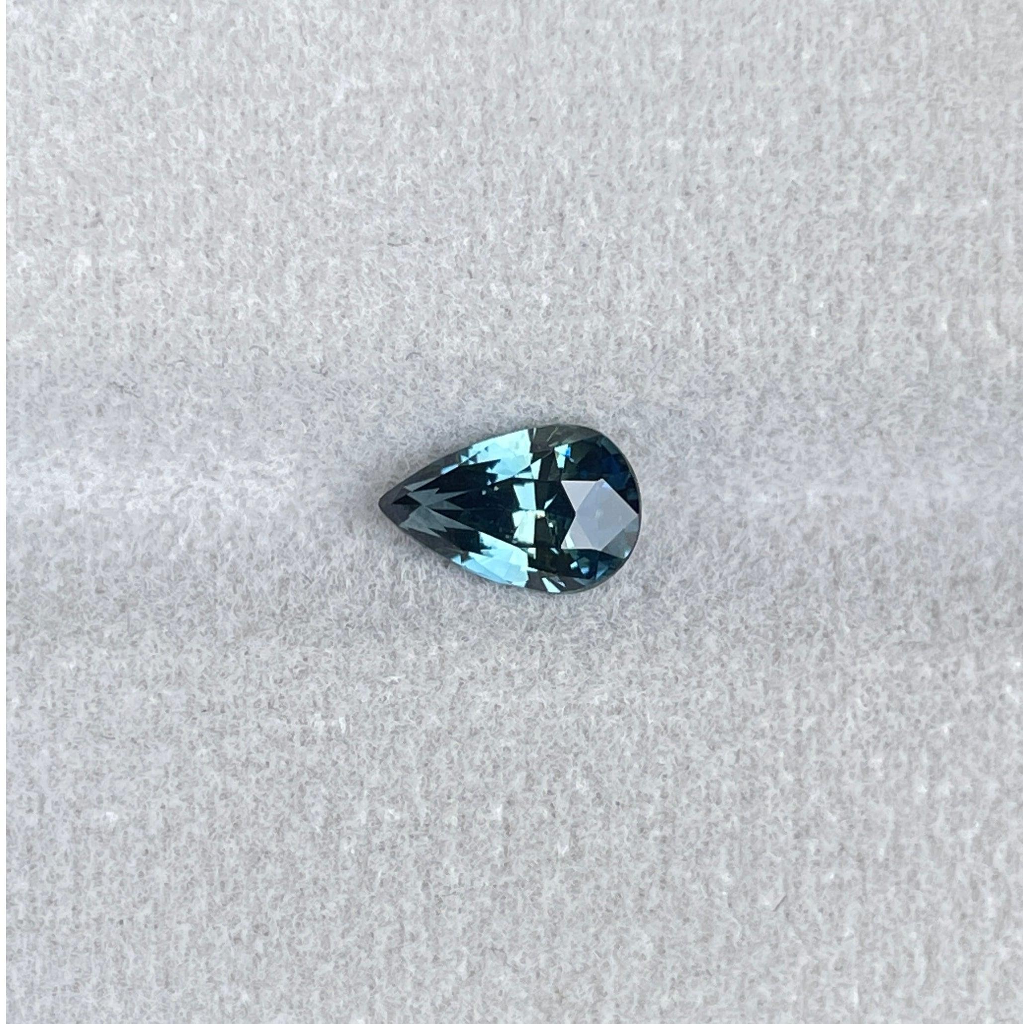 teal blue green parti sapphire pear drop cut gem