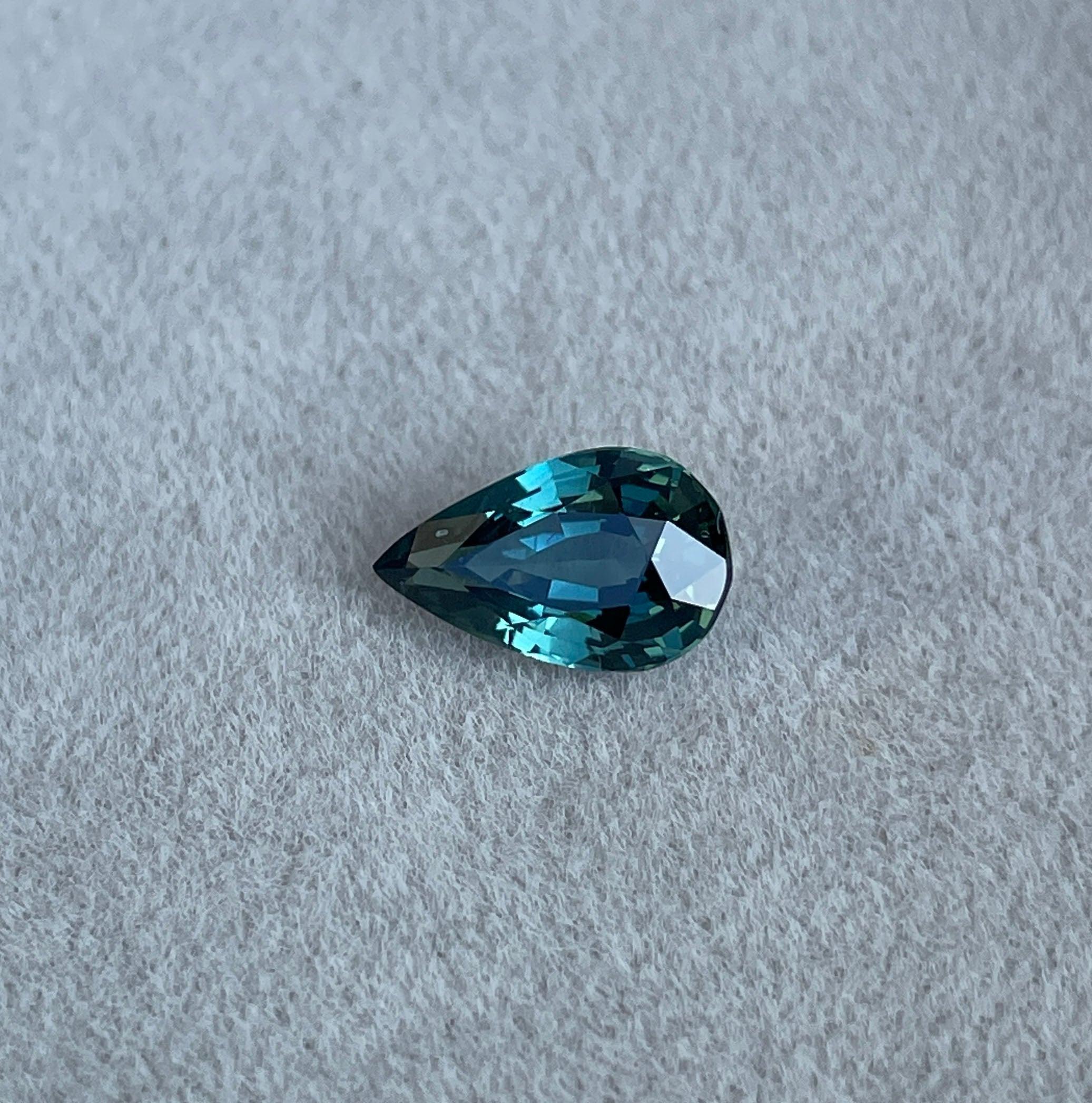 teal blue green parti sapphire pear drop cut gem