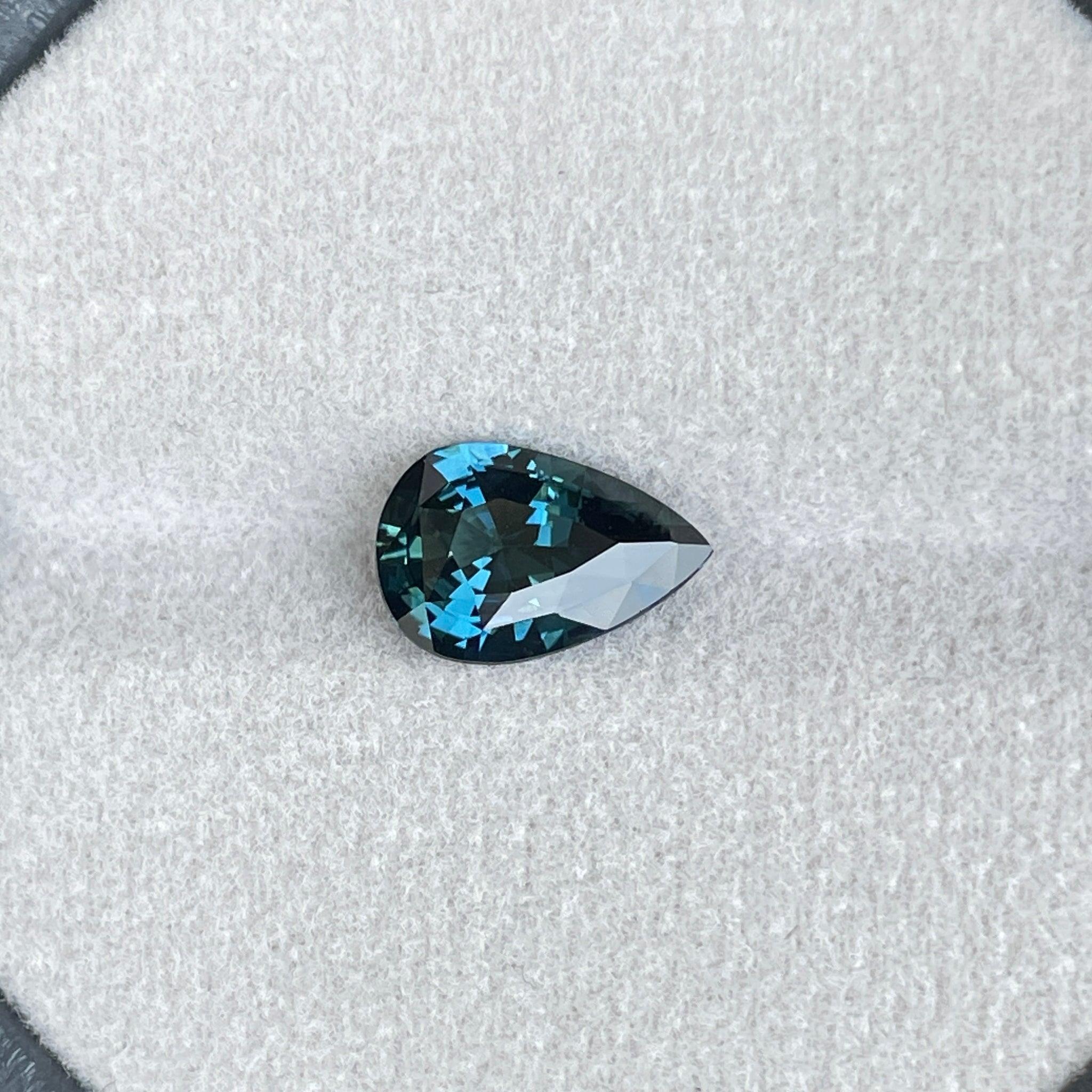 teal blue green parti sapphire pear drop cut gem