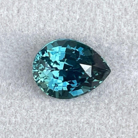 teal blue green parti sapphire pear drop cut gem