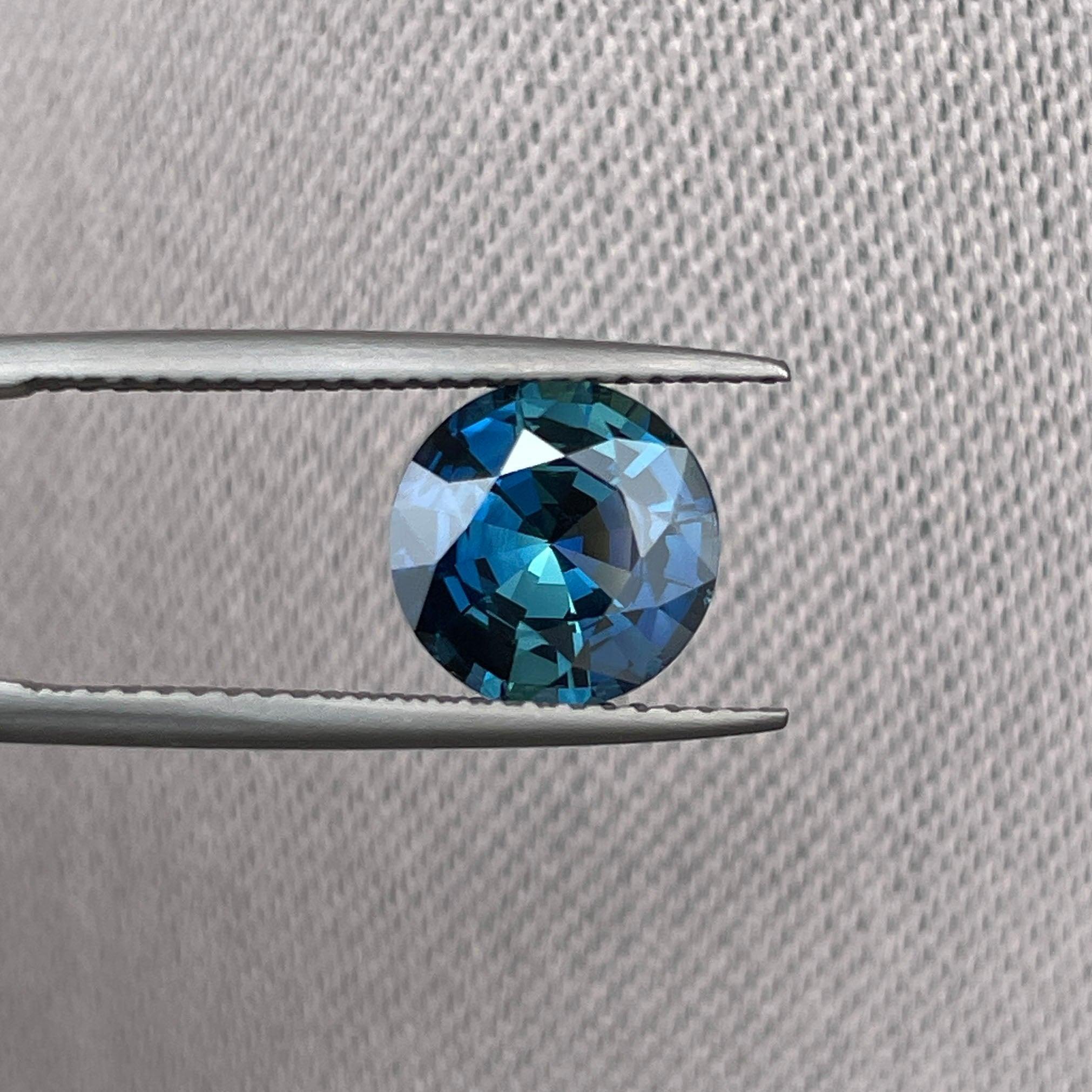 teal blue green parti sapphire round cut gem