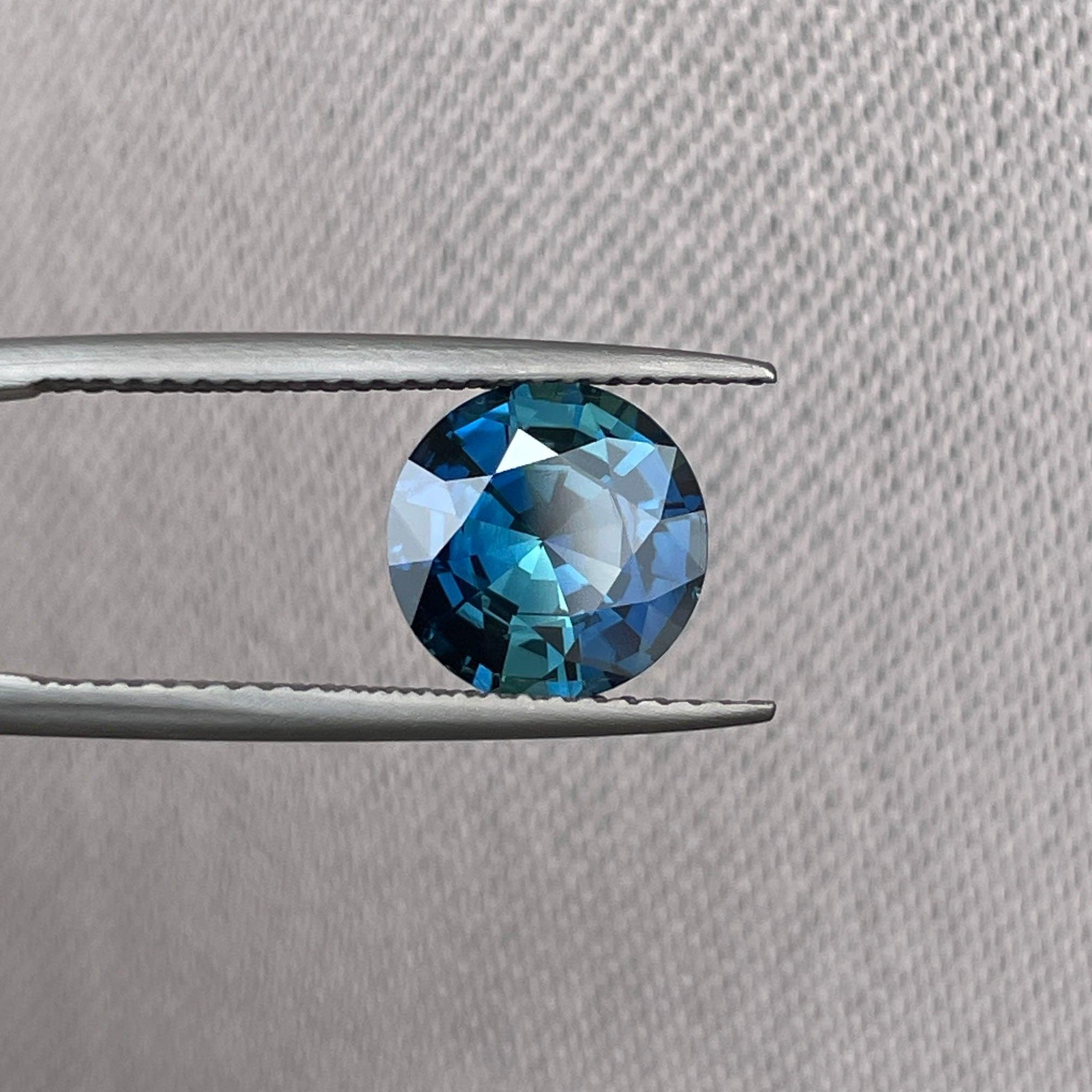 teal blue green parti sapphire round cut gem