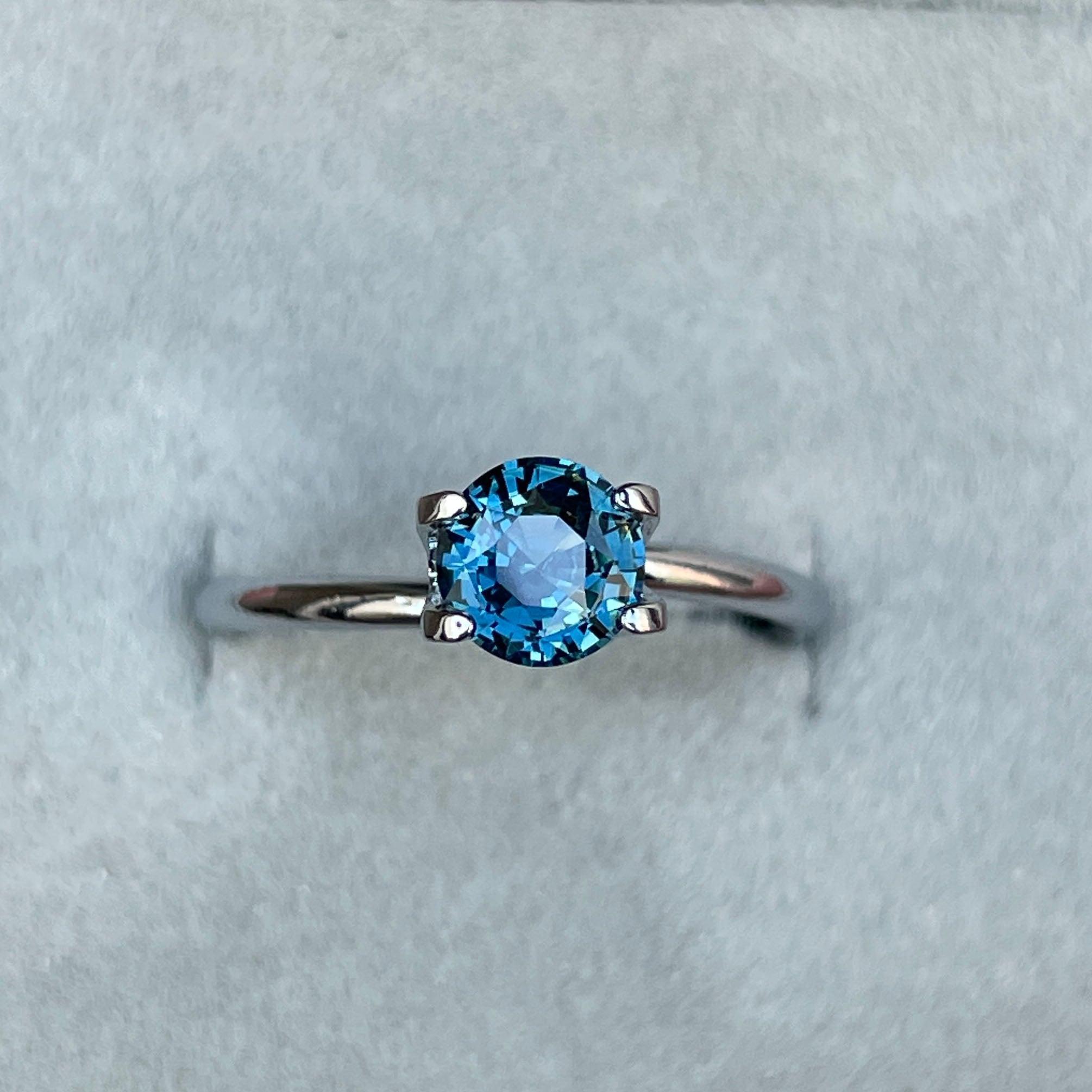 teal blue green parti sapphire round cut gem