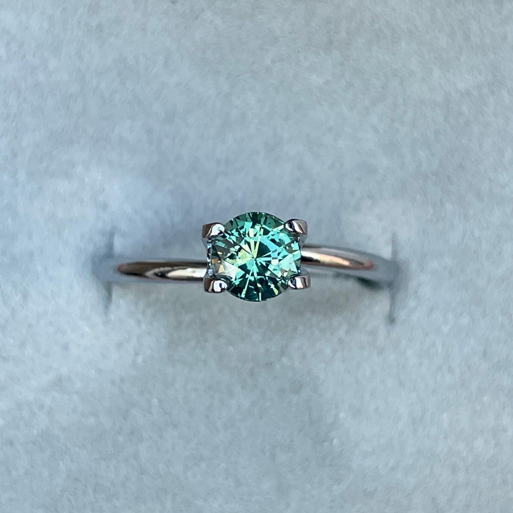 teal blue green parti sapphire round cut gem