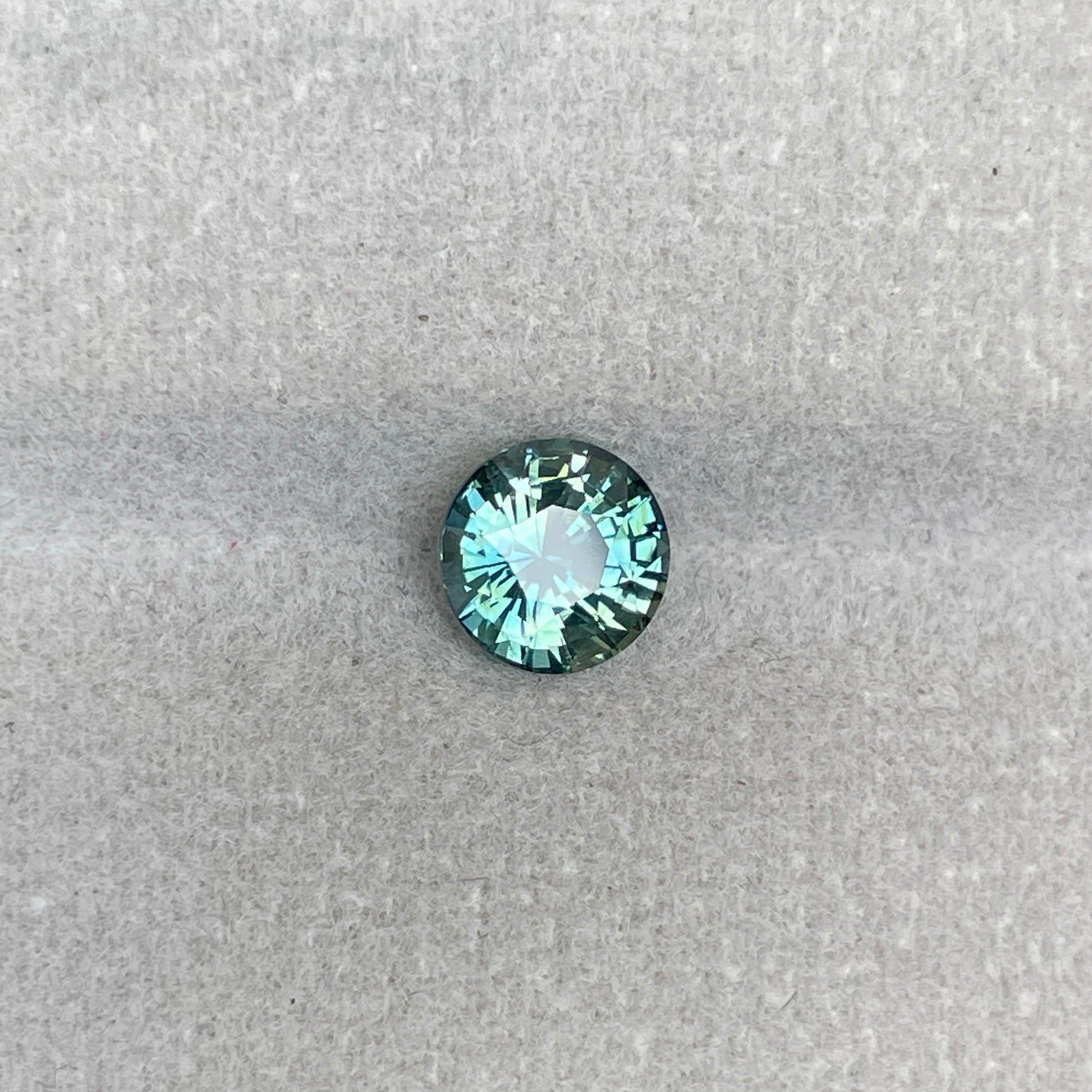 teal blue green parti sapphire round cut gem