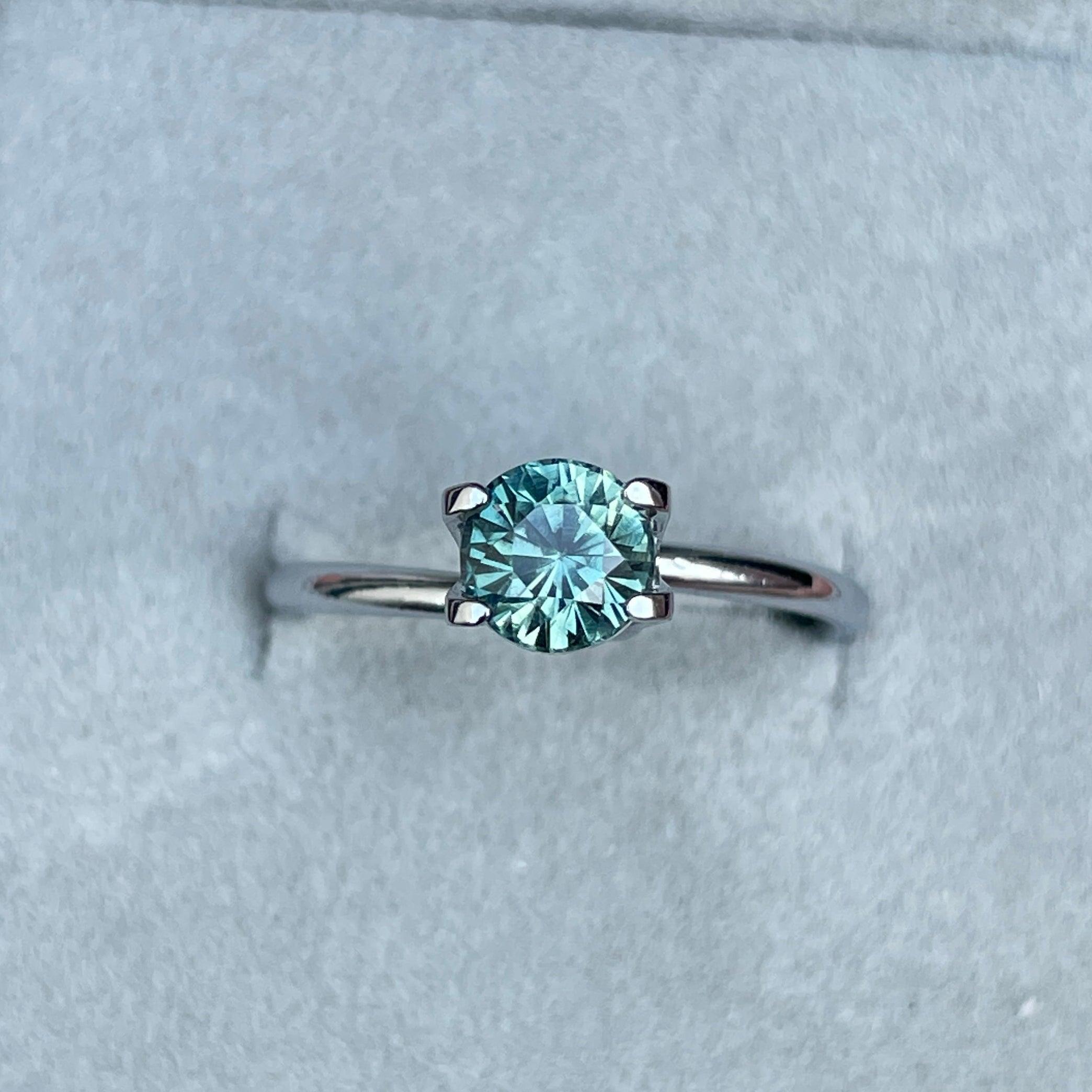 teal blue green parti sapphire round cut gem