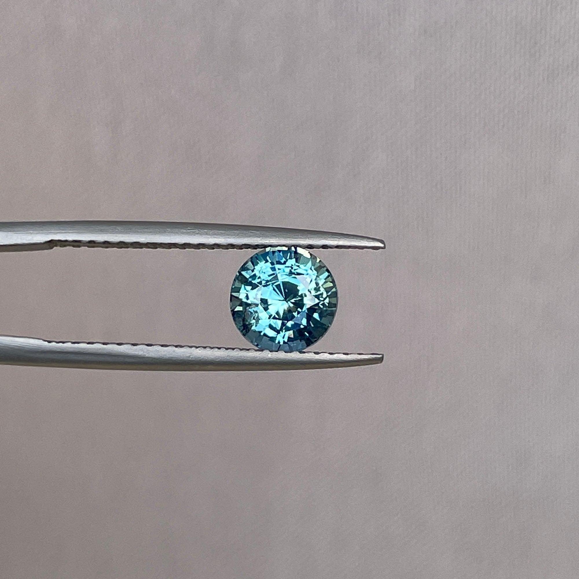 teal blue green parti sapphire round cut gem