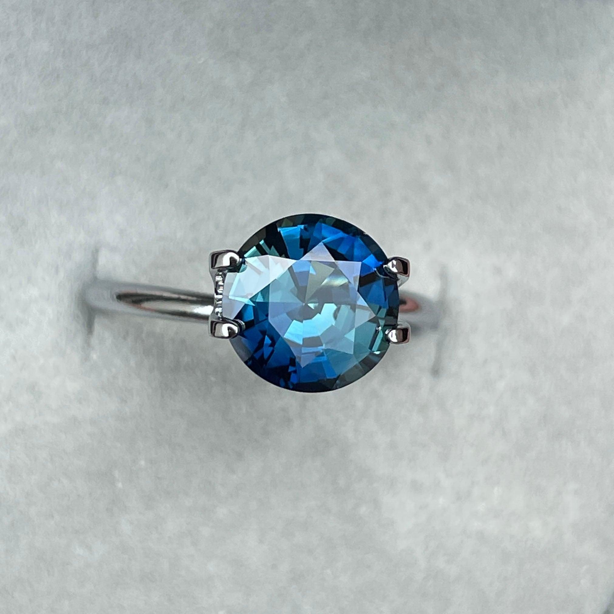 teal blue green parti sapphire round cut gem