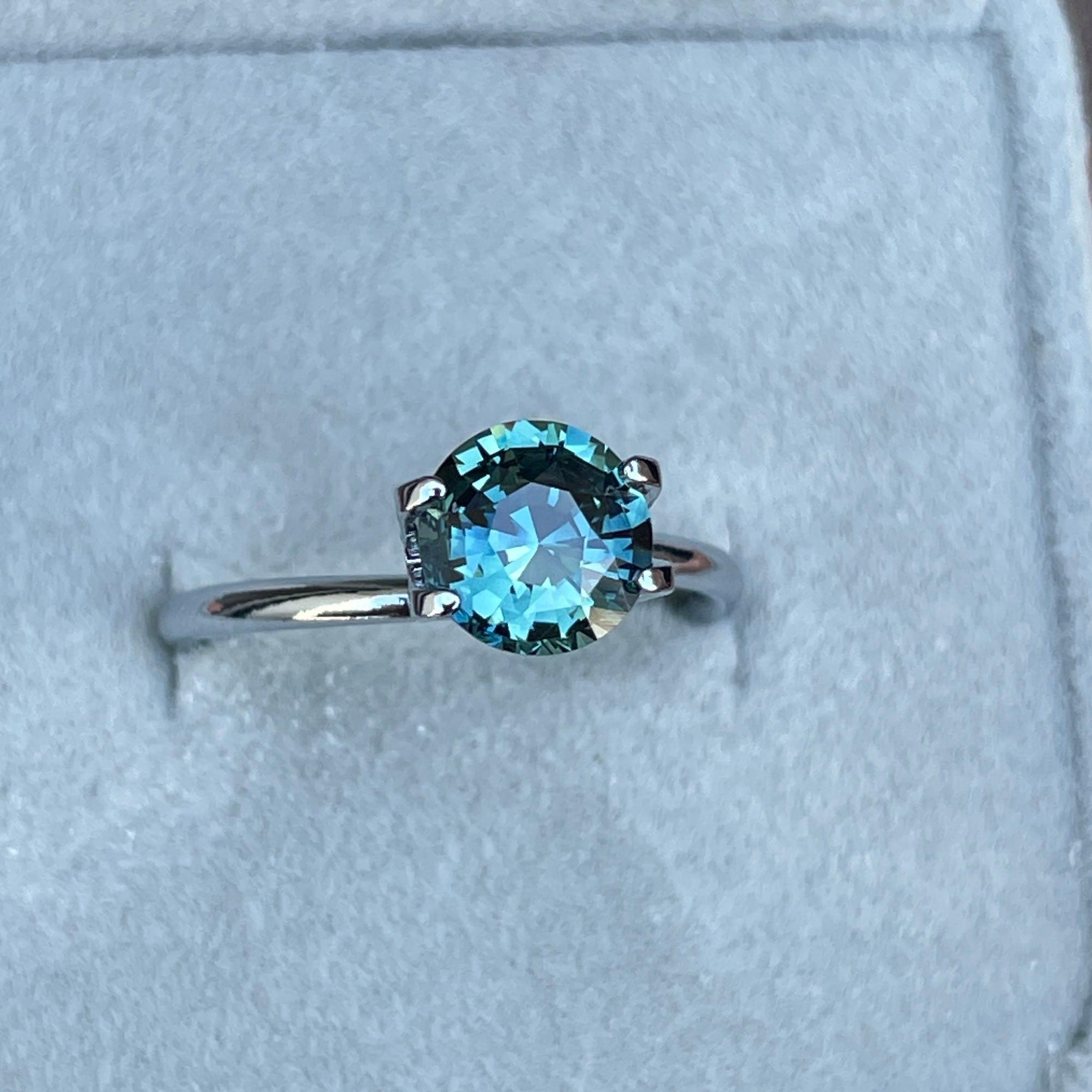 teal blue green parti sapphire round cut gem