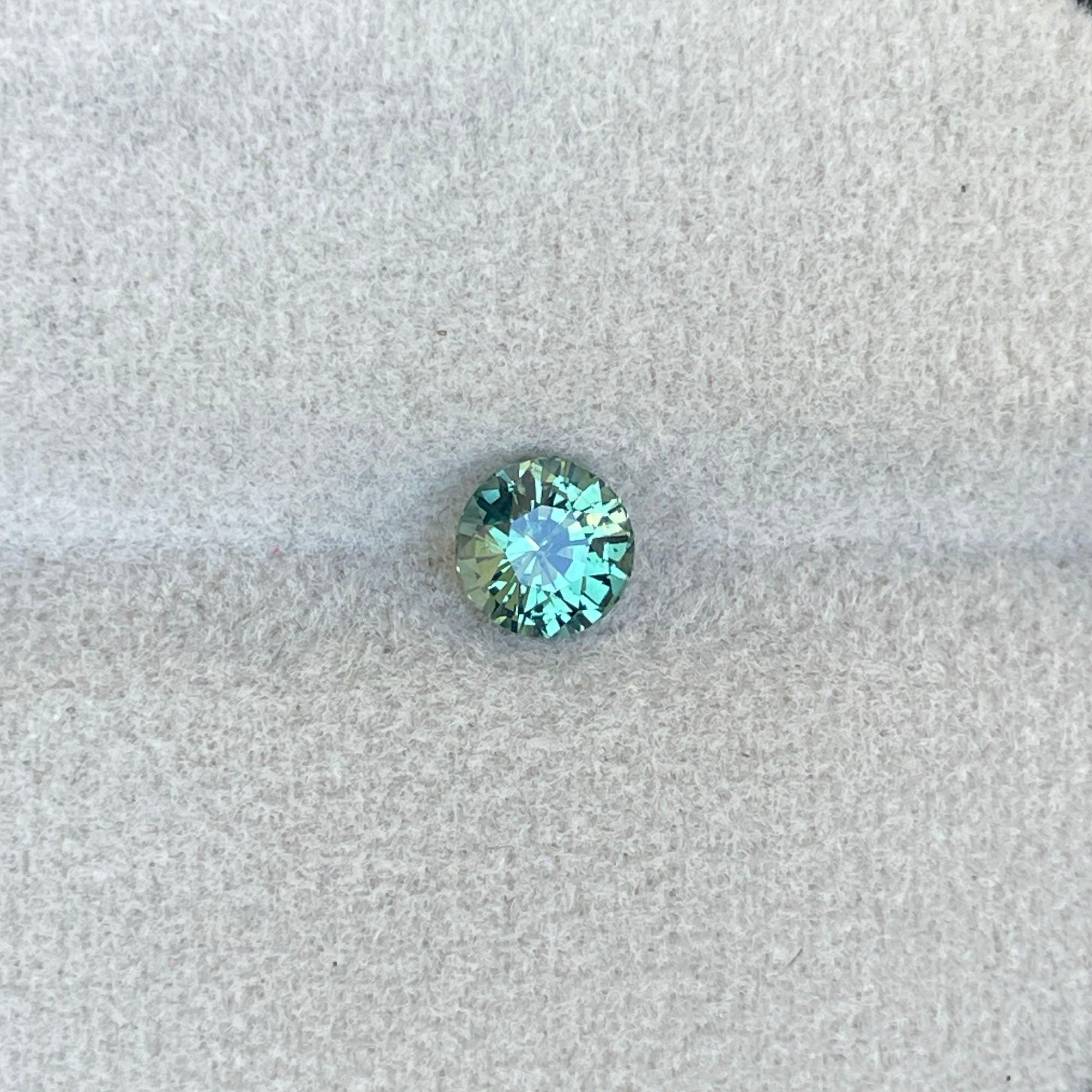 teal blue green parti sapphire round cut gem