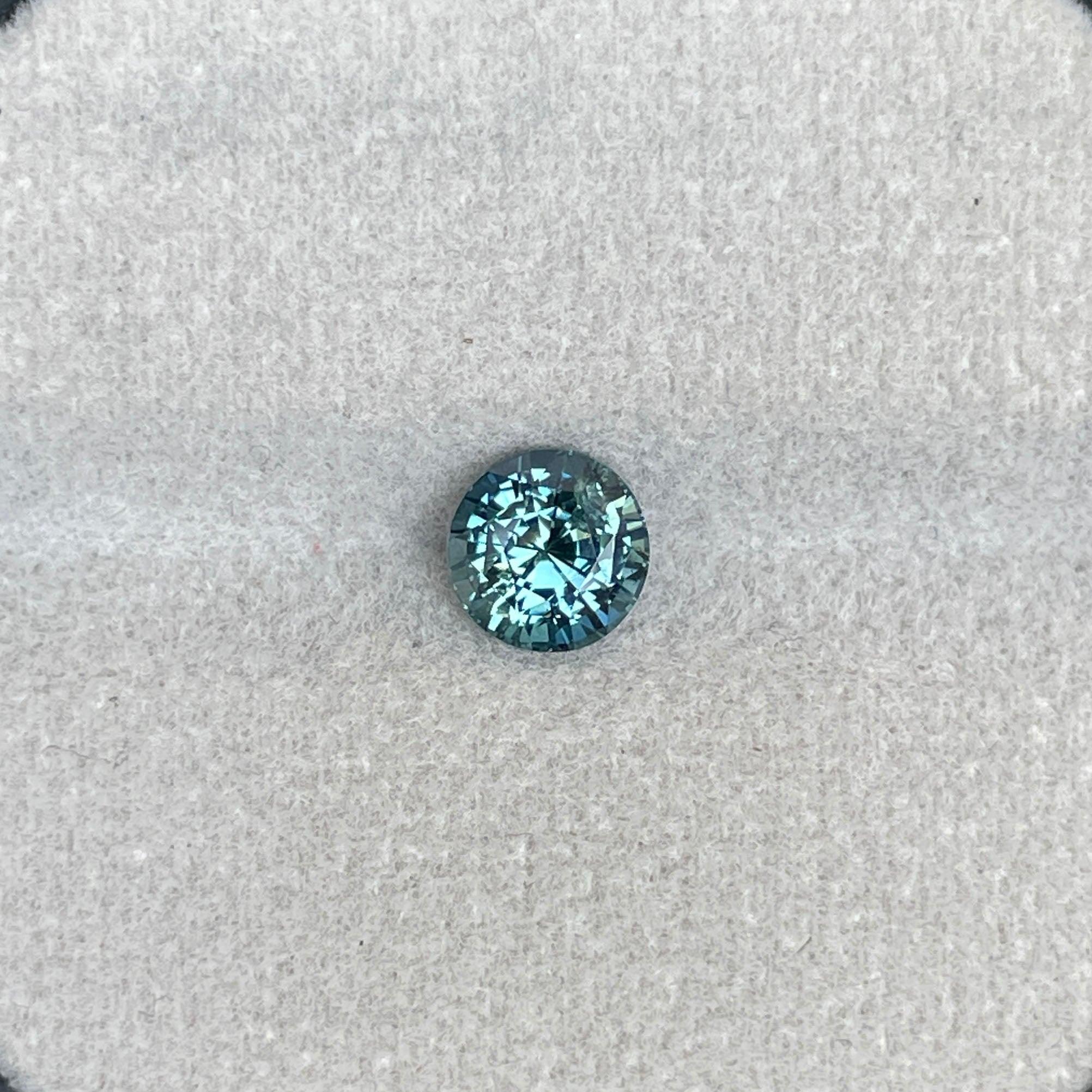 teal blue green parti sapphire round cut gem