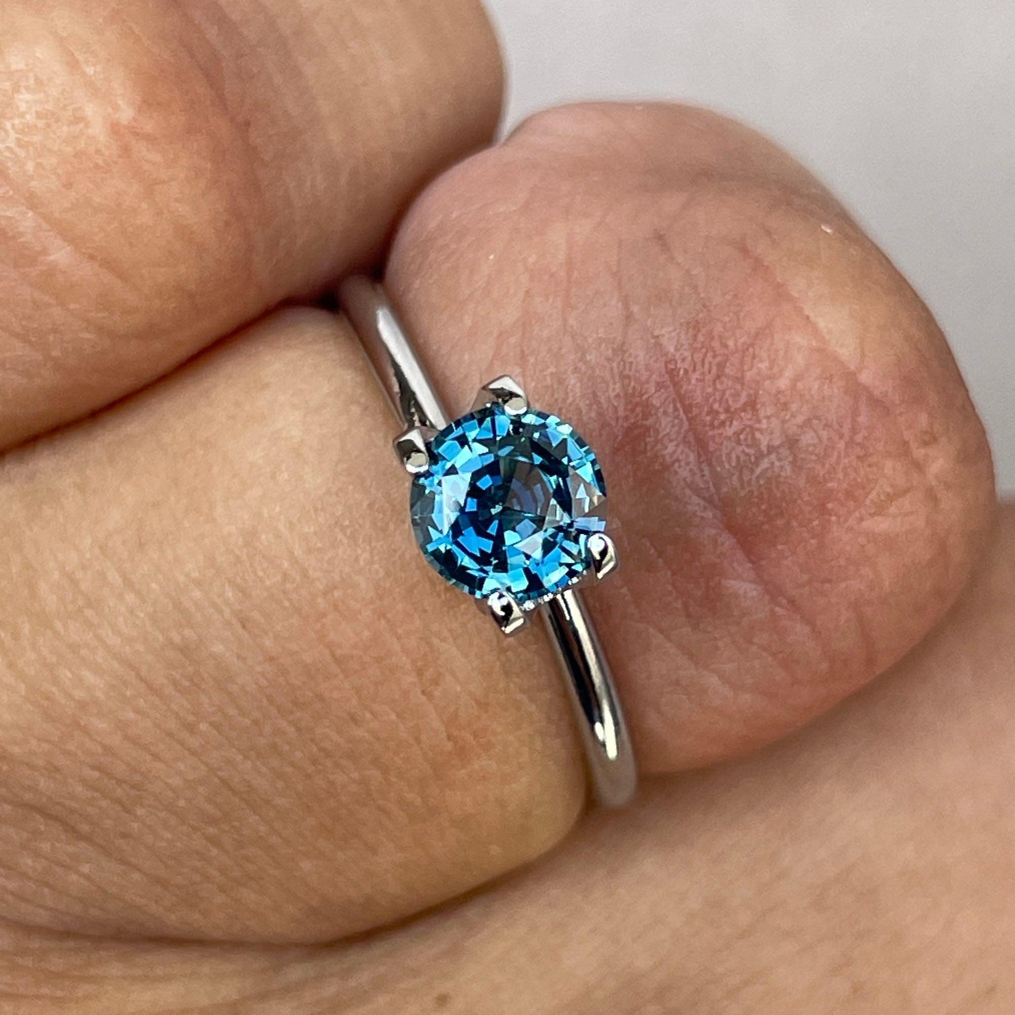 teal blue green parti sapphire round cut gem