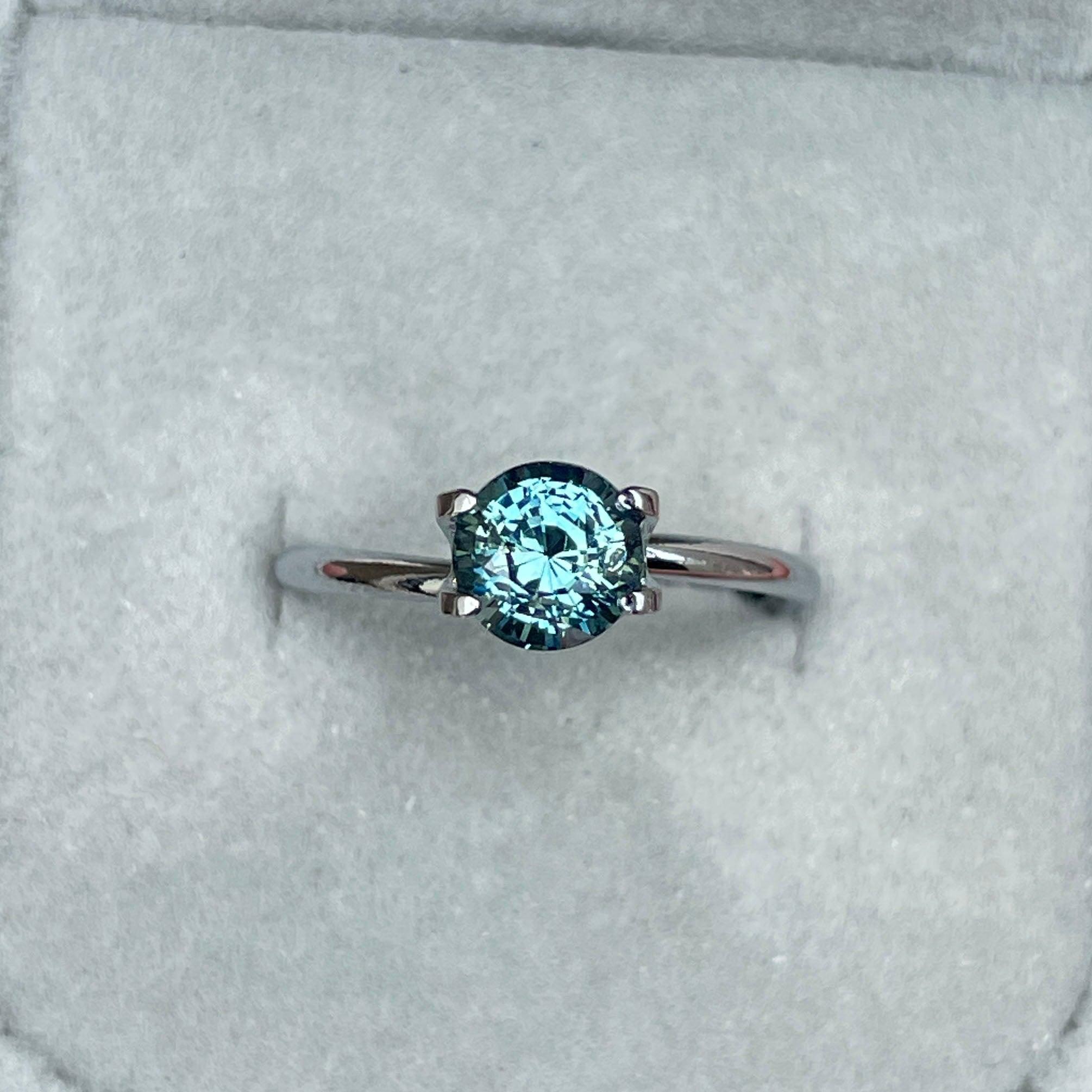 teal blue green parti sapphire round cut gem