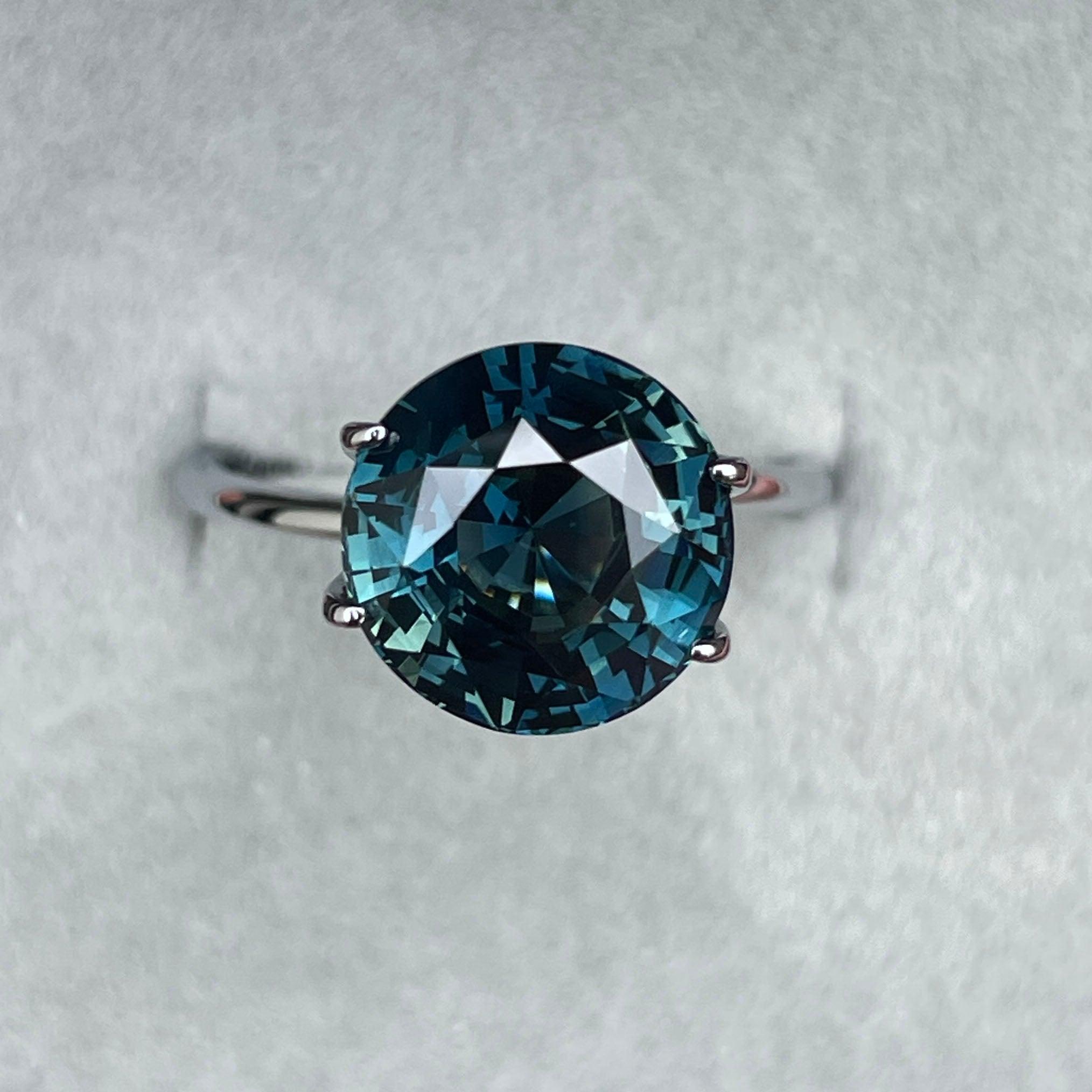 teal blue green parti sapphire round cut gem