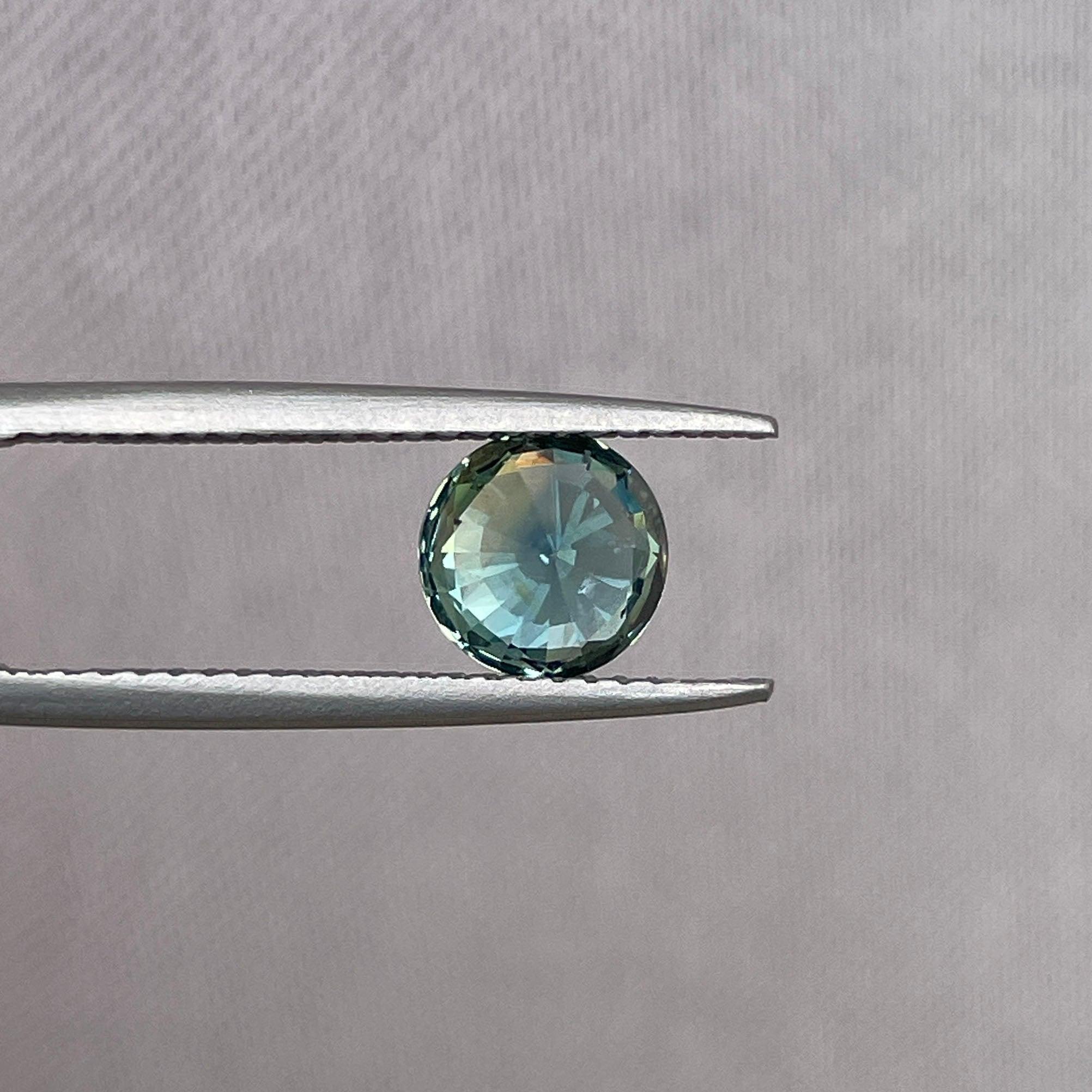 teal blue green parti sapphire round cut gem