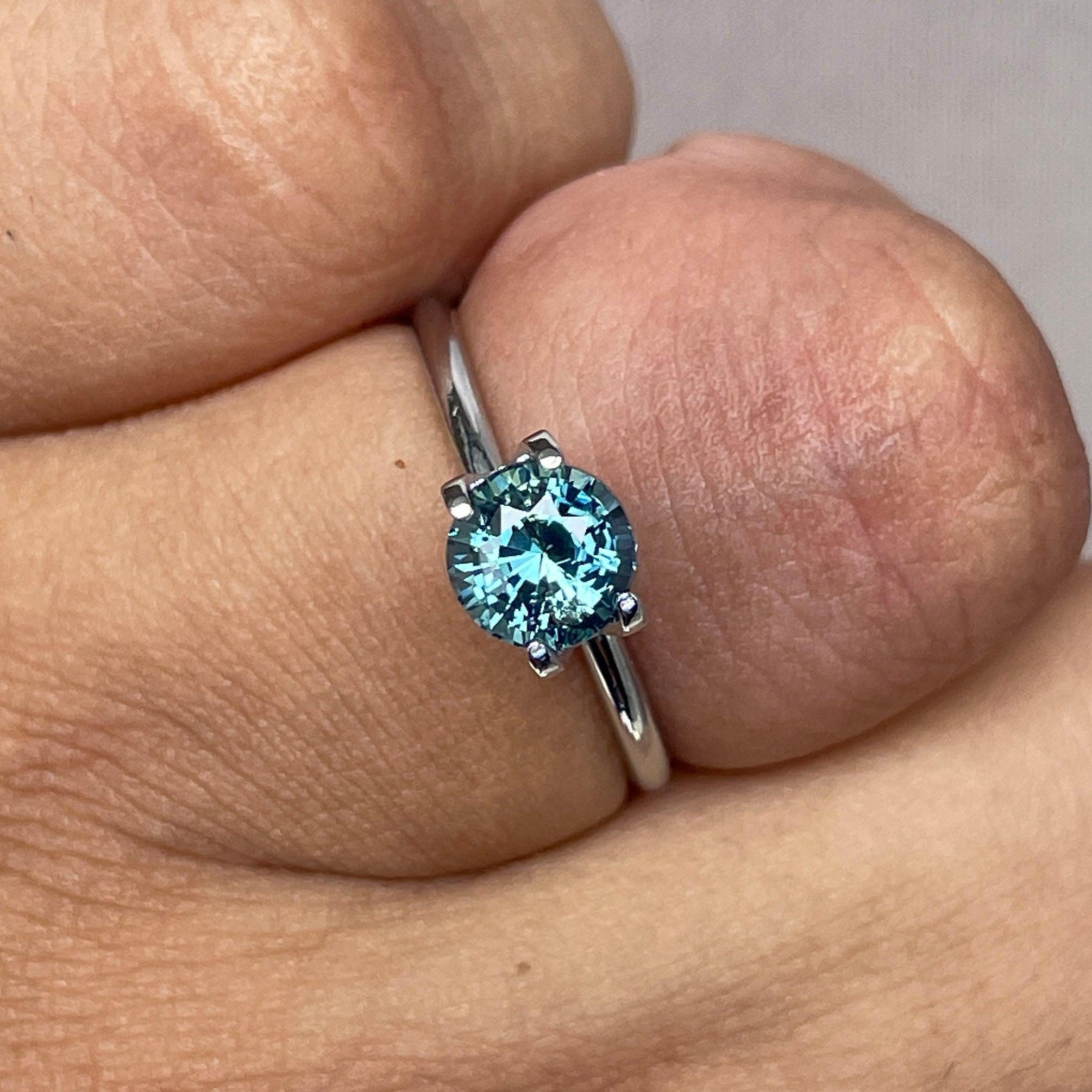 teal blue green parti sapphire round cut gem
