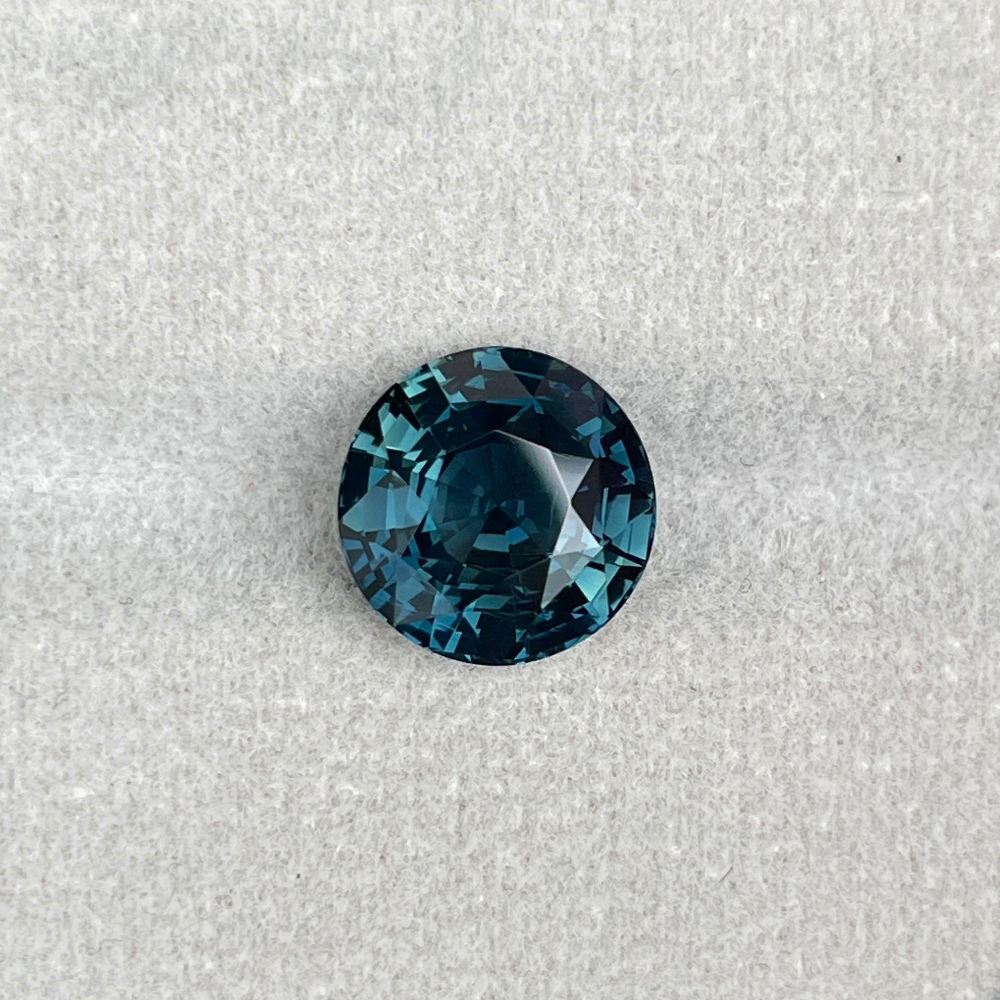 teal blue green parti sapphire round cut gem
