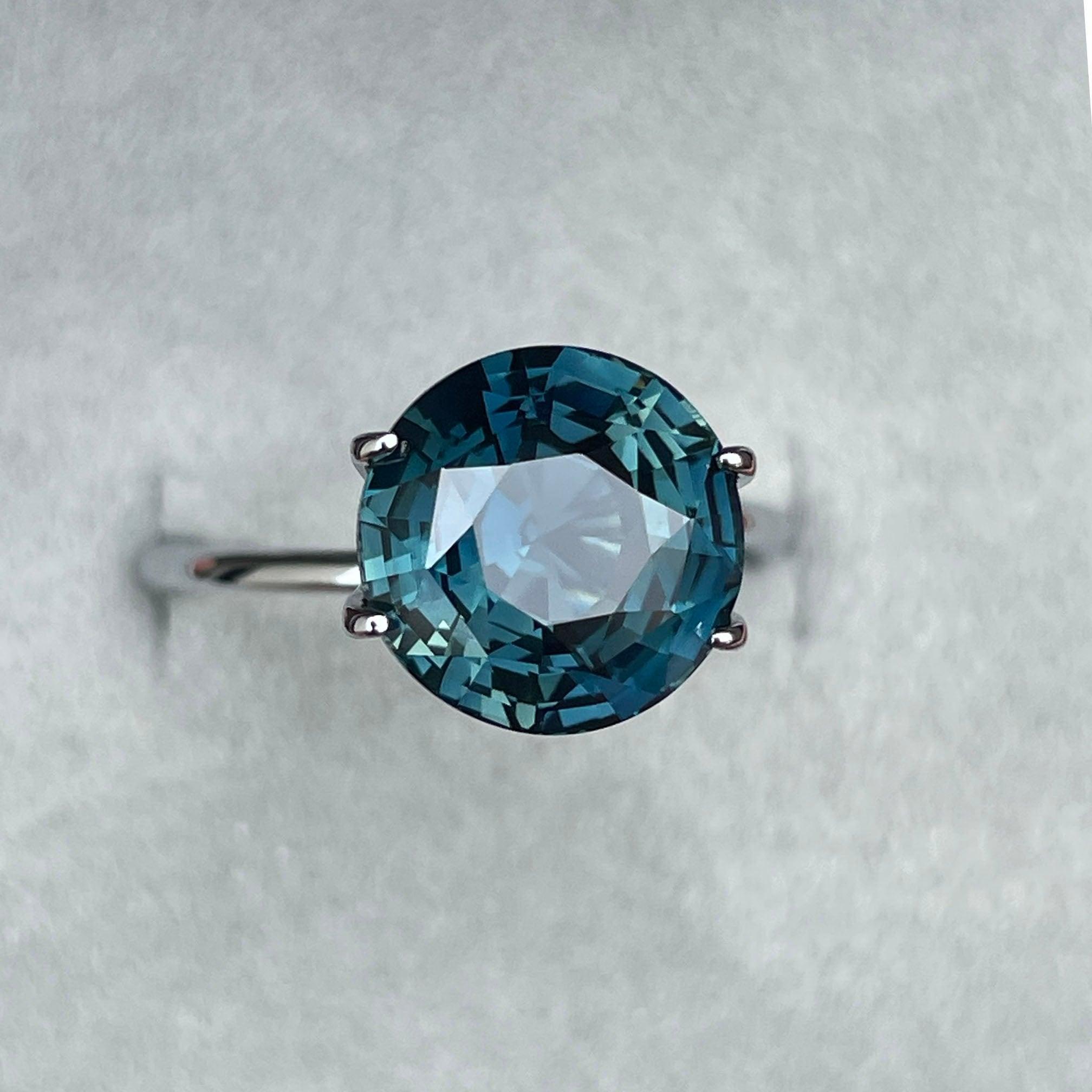 teal blue green parti sapphire round cut gem