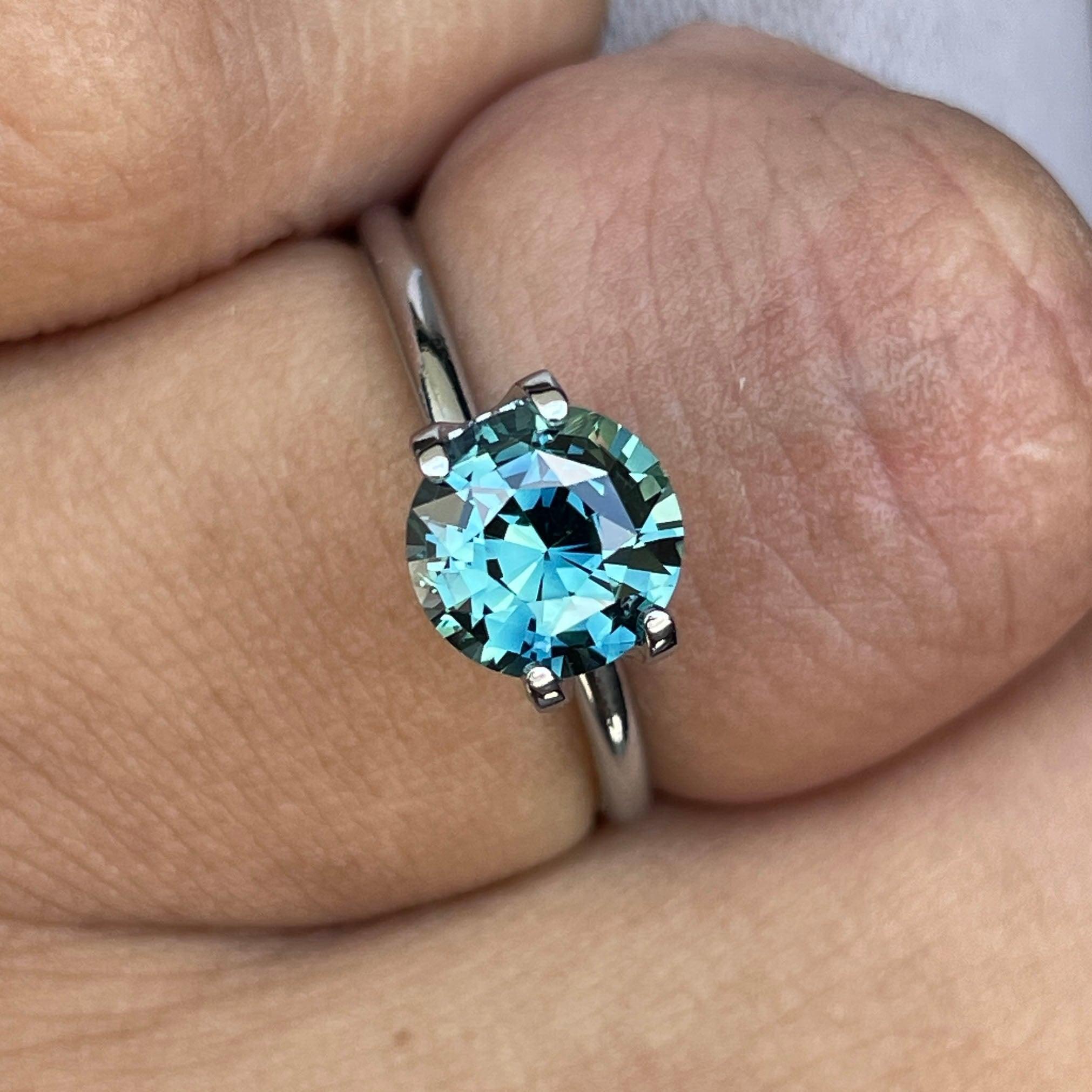 teal blue green parti sapphire round cut gem