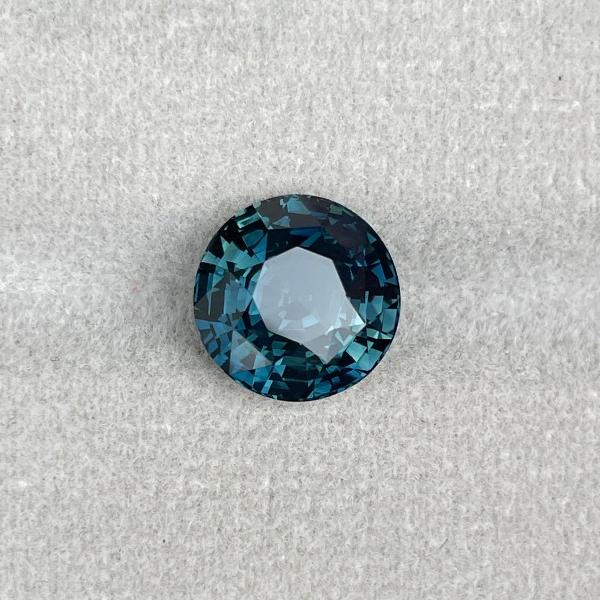 teal blue green parti sapphire round cut gem