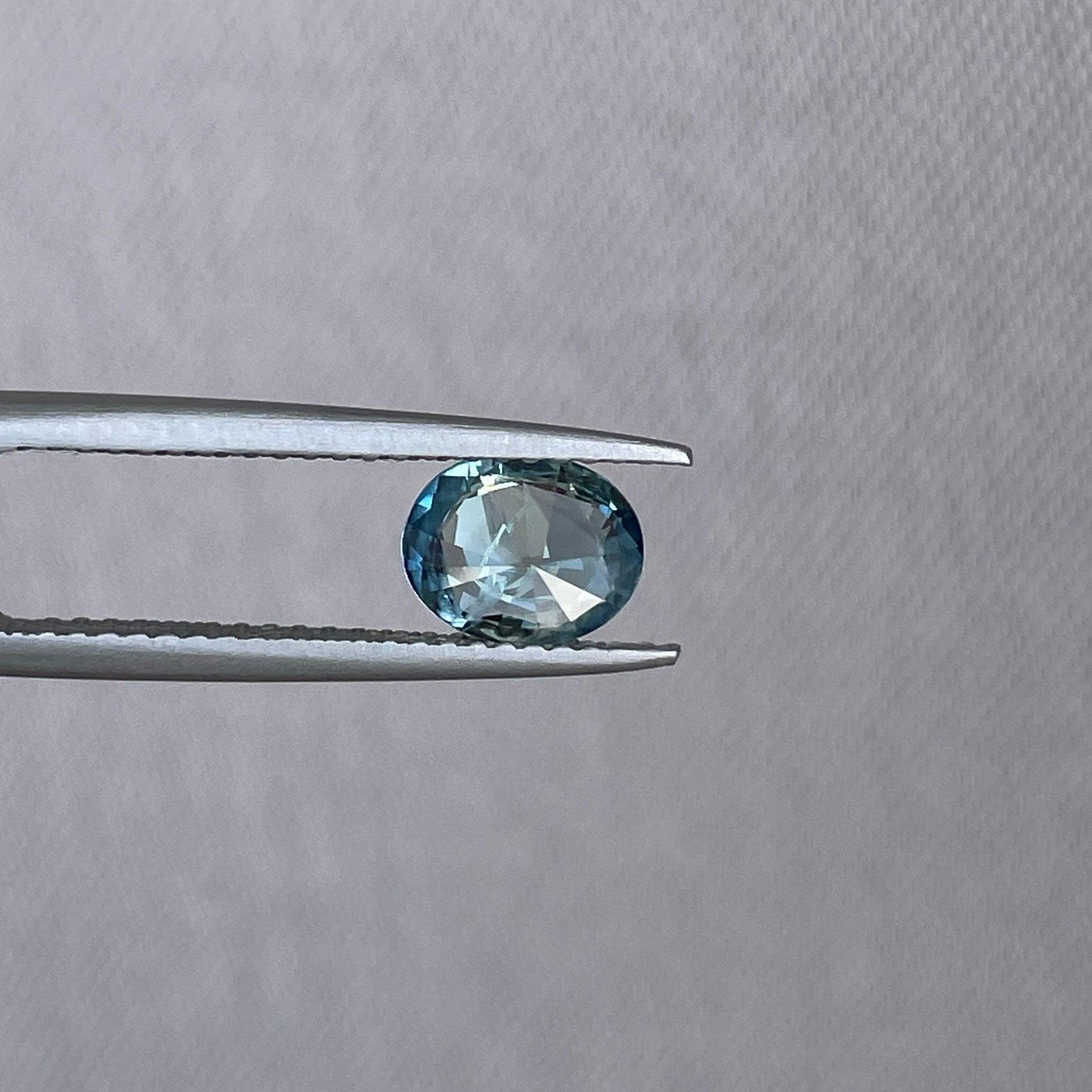 teal sapphire engagement ring