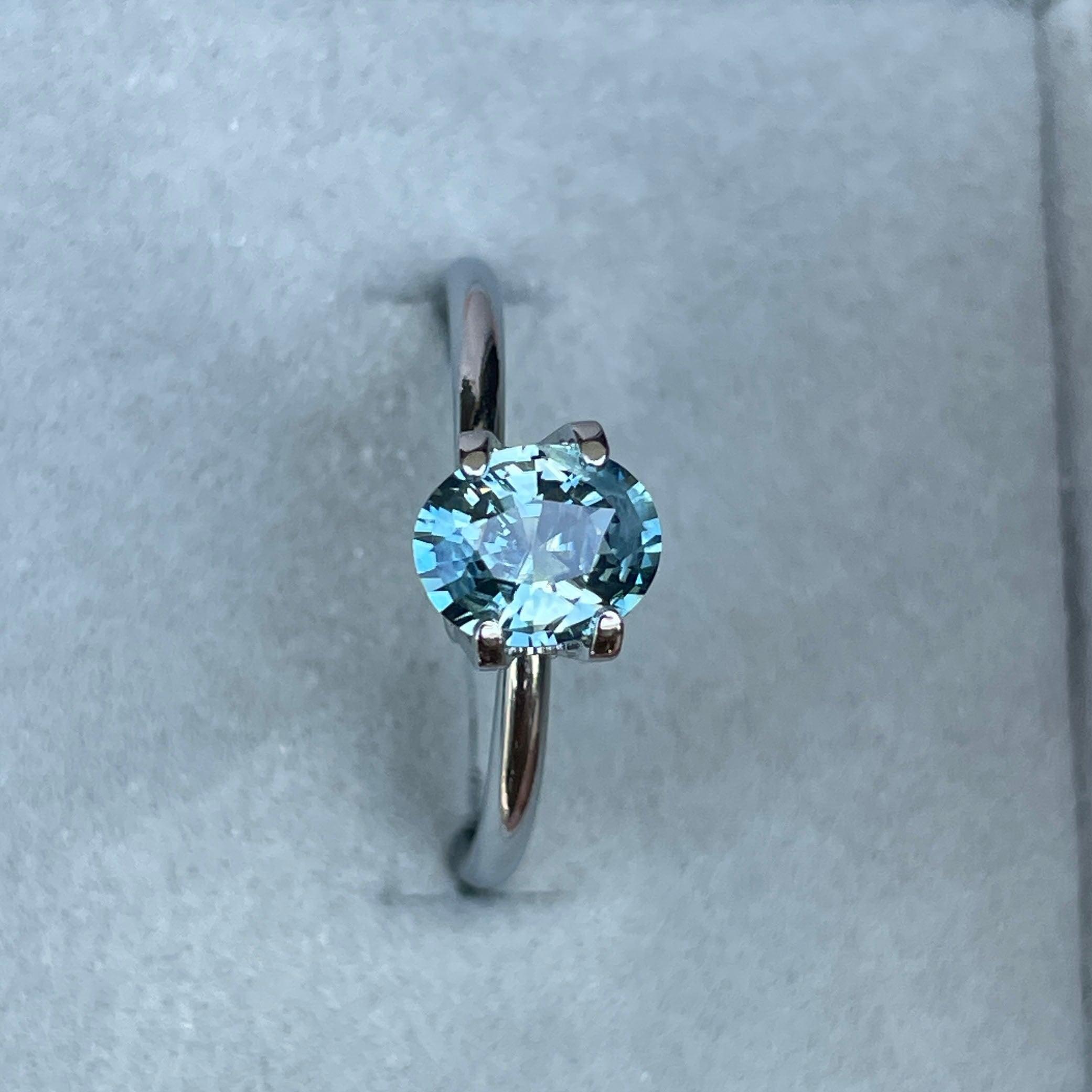 teal sapphire engagement ring