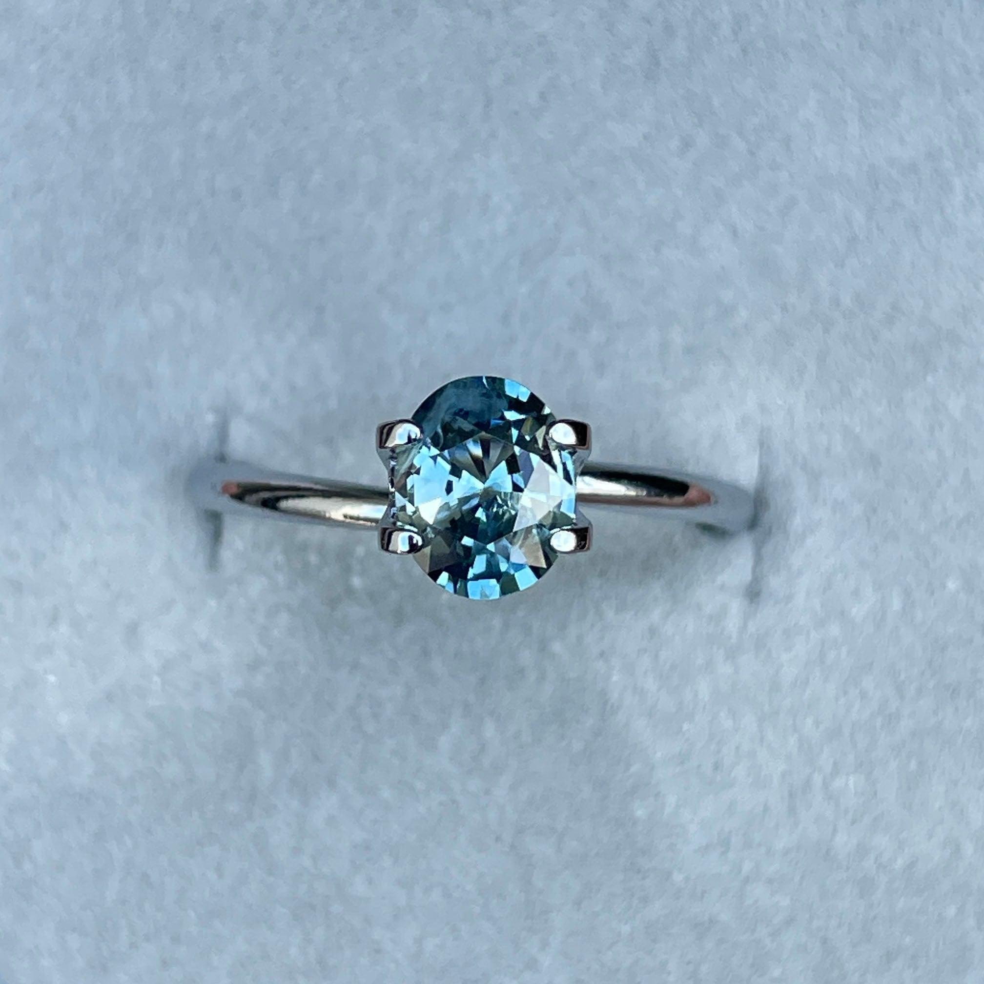 teal sapphire engagement ring