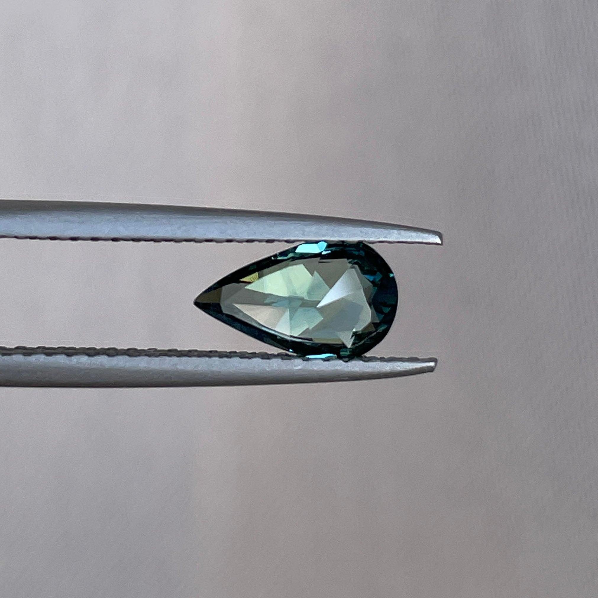 teal sapphire engagement ring