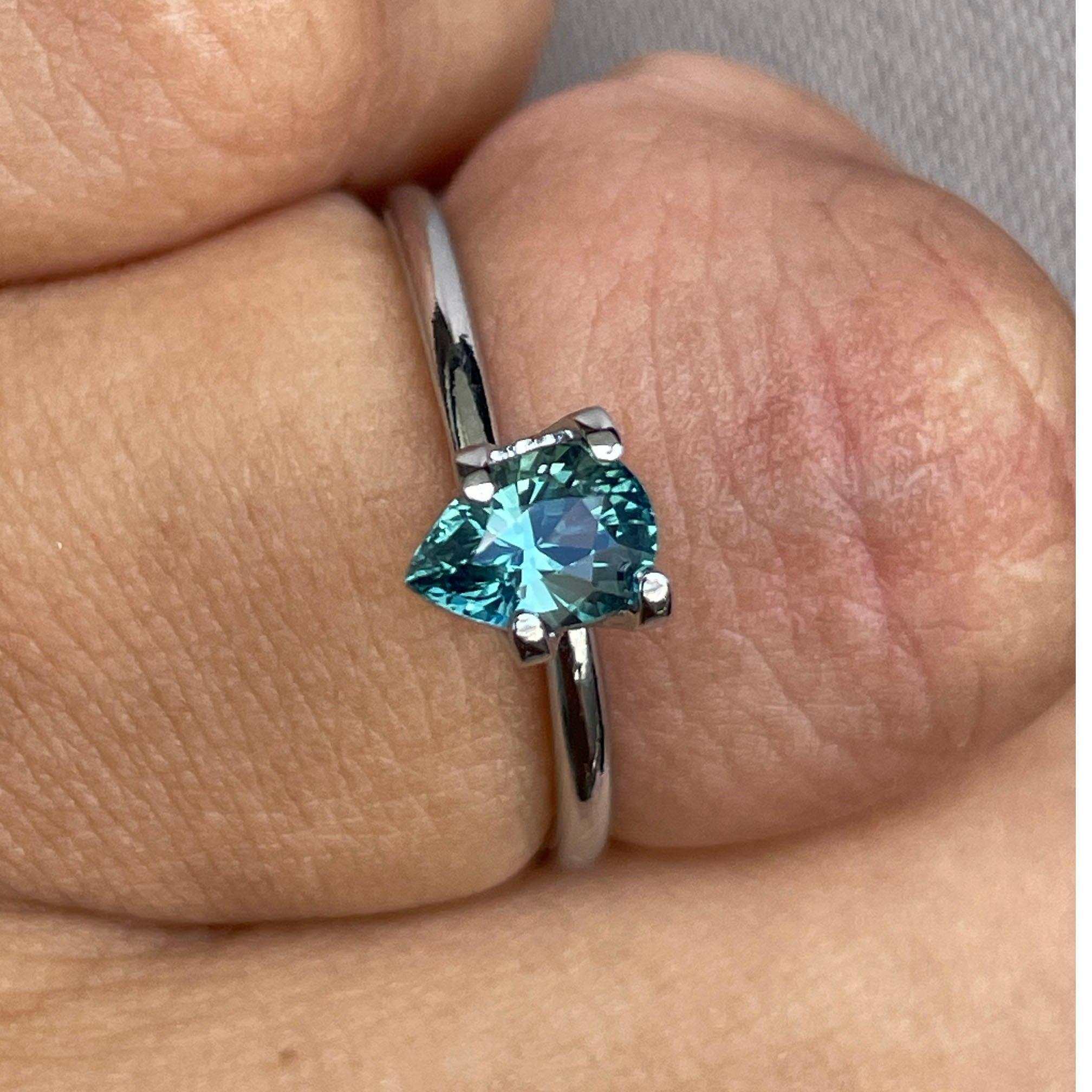 teal sapphire engagement ring
