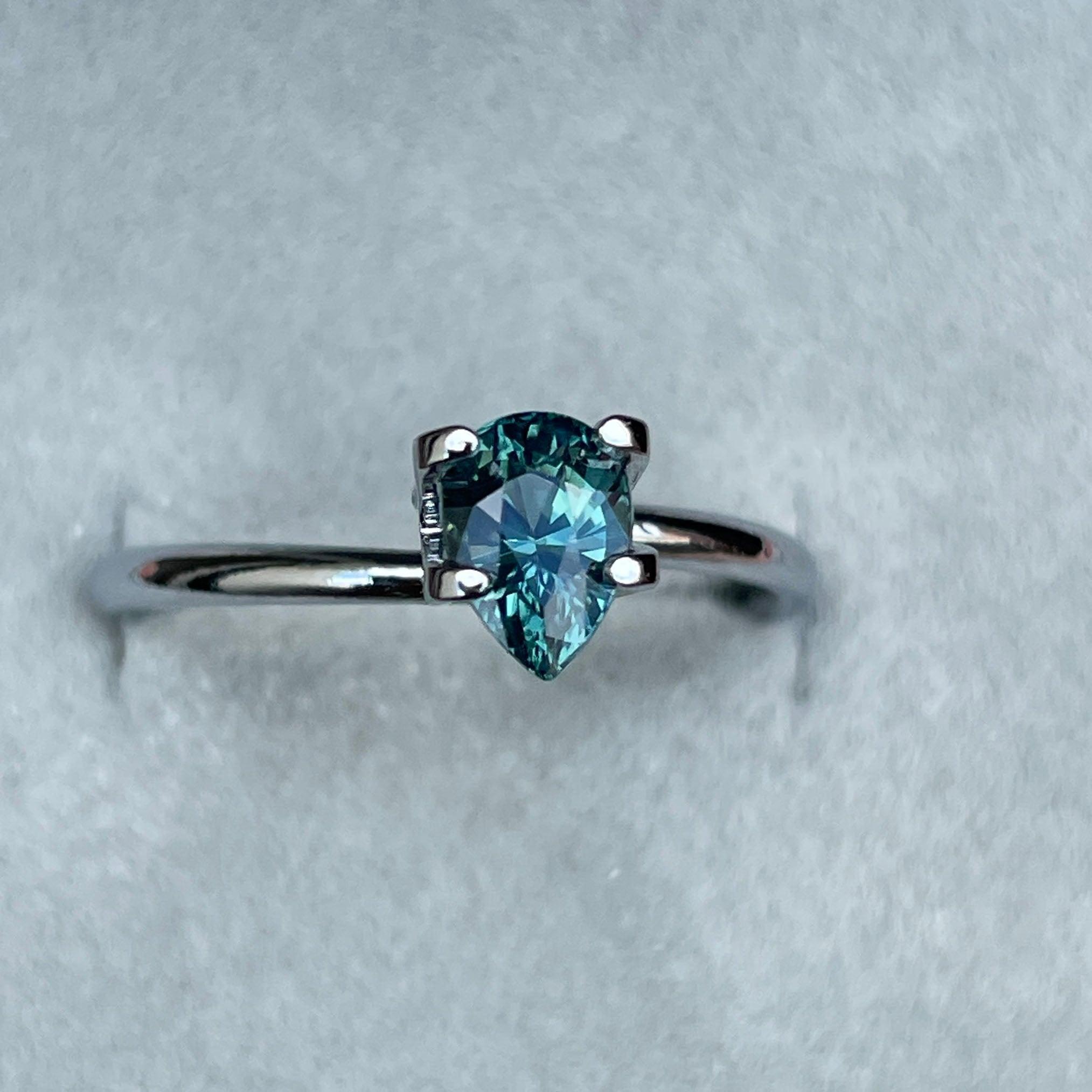 teal sapphire engagement ring