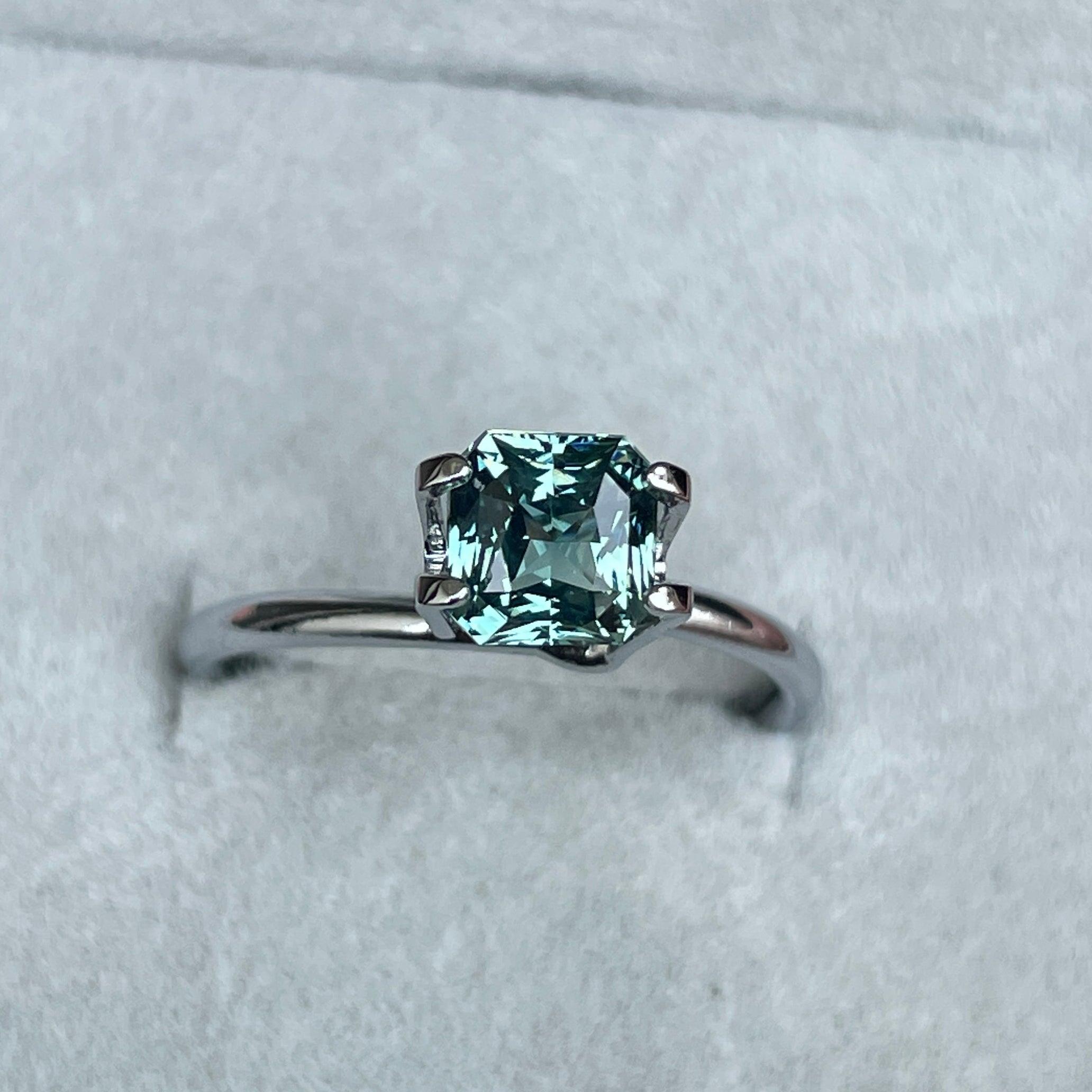 teal sapphire engagement rings