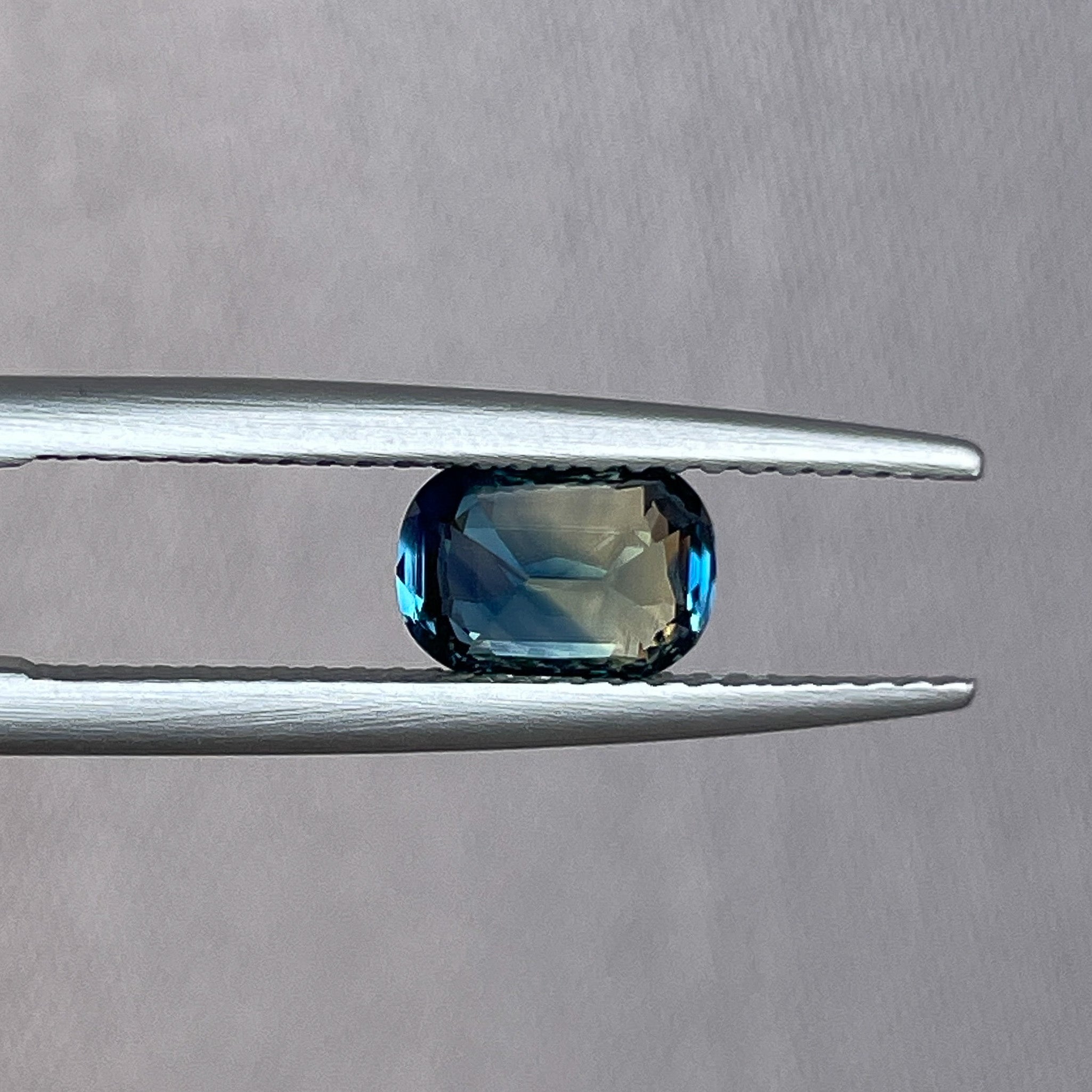 Natural teal sapphire 1.36 ct cushion cut loose gemstone from NASHGEMS, ideal for engagement rings or custom jewelry.
