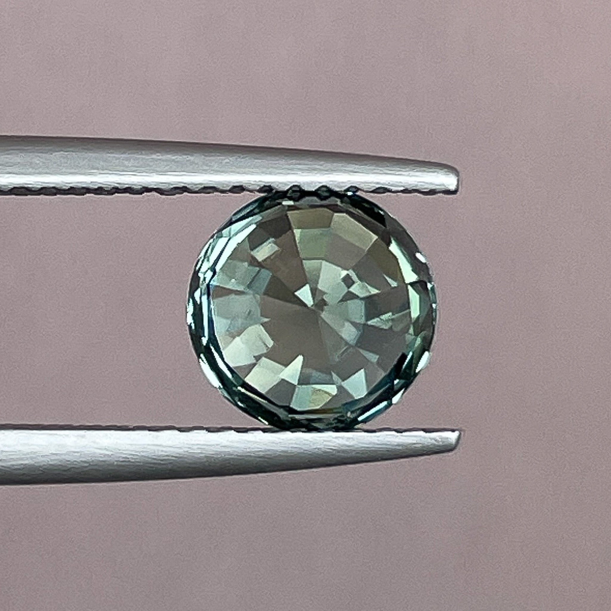 Teal green natural sapphire, 2.50 Ct round cut, loose gemstone by NASHGEMS for engagement or custom jewelry.