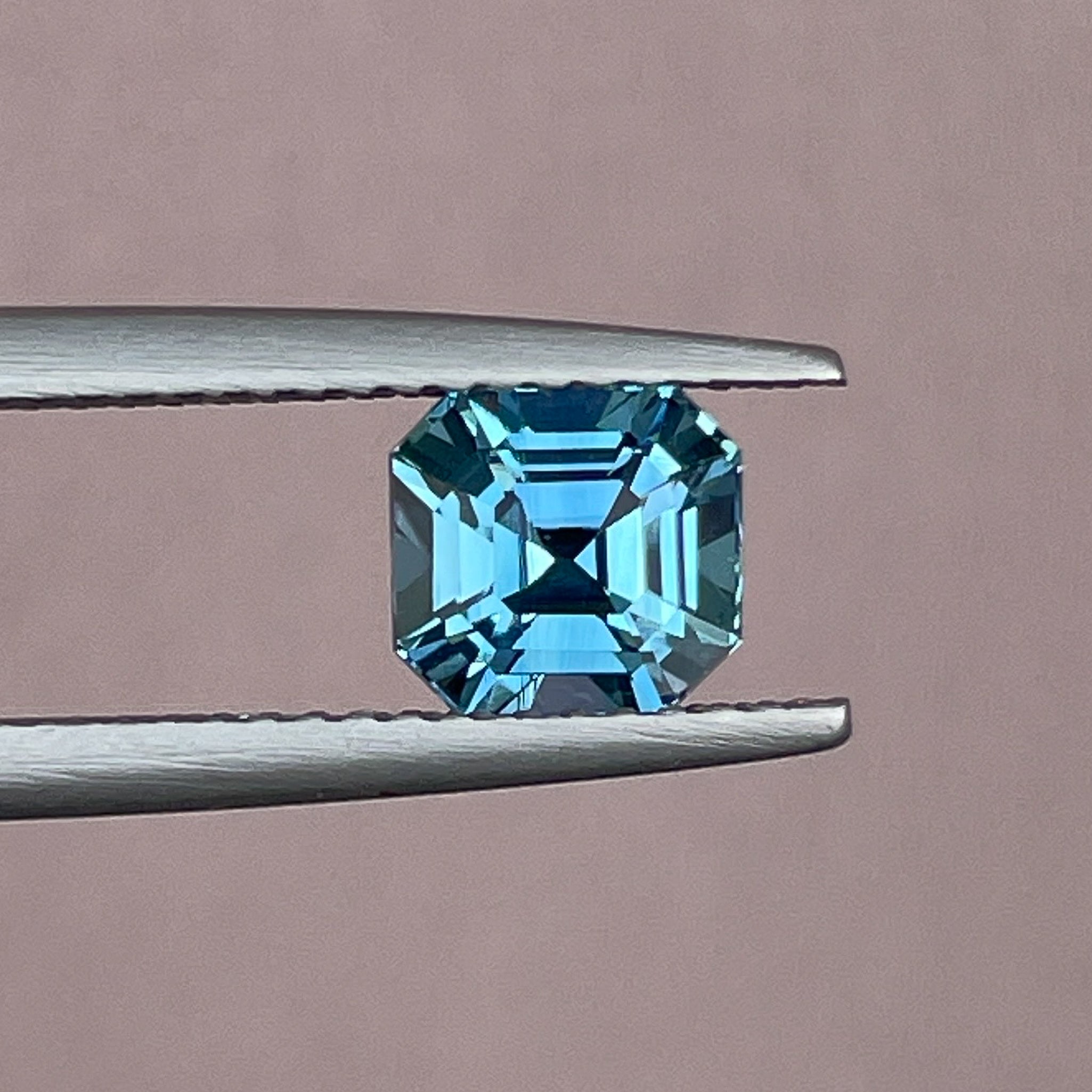 Natural teal sapphire 1.76 Ct Asscher octagon cut from NASHGEMS, heat-treated loose teal sapphire for jewelry or engagement rings.